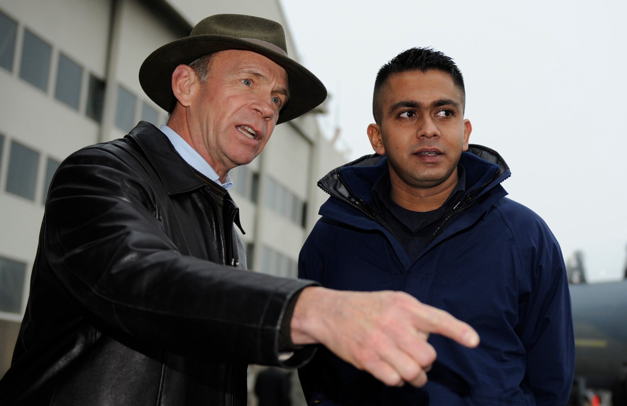 MOUNTAIN HOME AIR FORCE BASE, Idaho – Republic of Singapore air force 1st Sgt. Shyam Rohitkumar, 428th Fighter Squadron flight crew, answers questions from Mayor of Nampa, Idaho, Tom Dale, about the F-15SG fighter jet at Mountain Home Air Force Base Jan. 6. More than 40 legislators visited the base and were shown how Airmen monitor the airspace and how the current efforts to expand the base’s airspace will improve future training. (U.S. Air Force photo by Airman 1st Class Renishia Richardson)