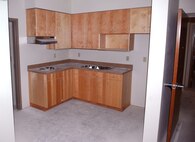MINOT AIR FORCE BASE, N.D. -- The kitchen of a suite in the new dormitory being built here is shown in the final stages of its construction Jan. 6. Construction such as this is part of a continuing approach at improving base facilities. (U.S. Air Force photo by Senior Airman Michael J. Veloz)