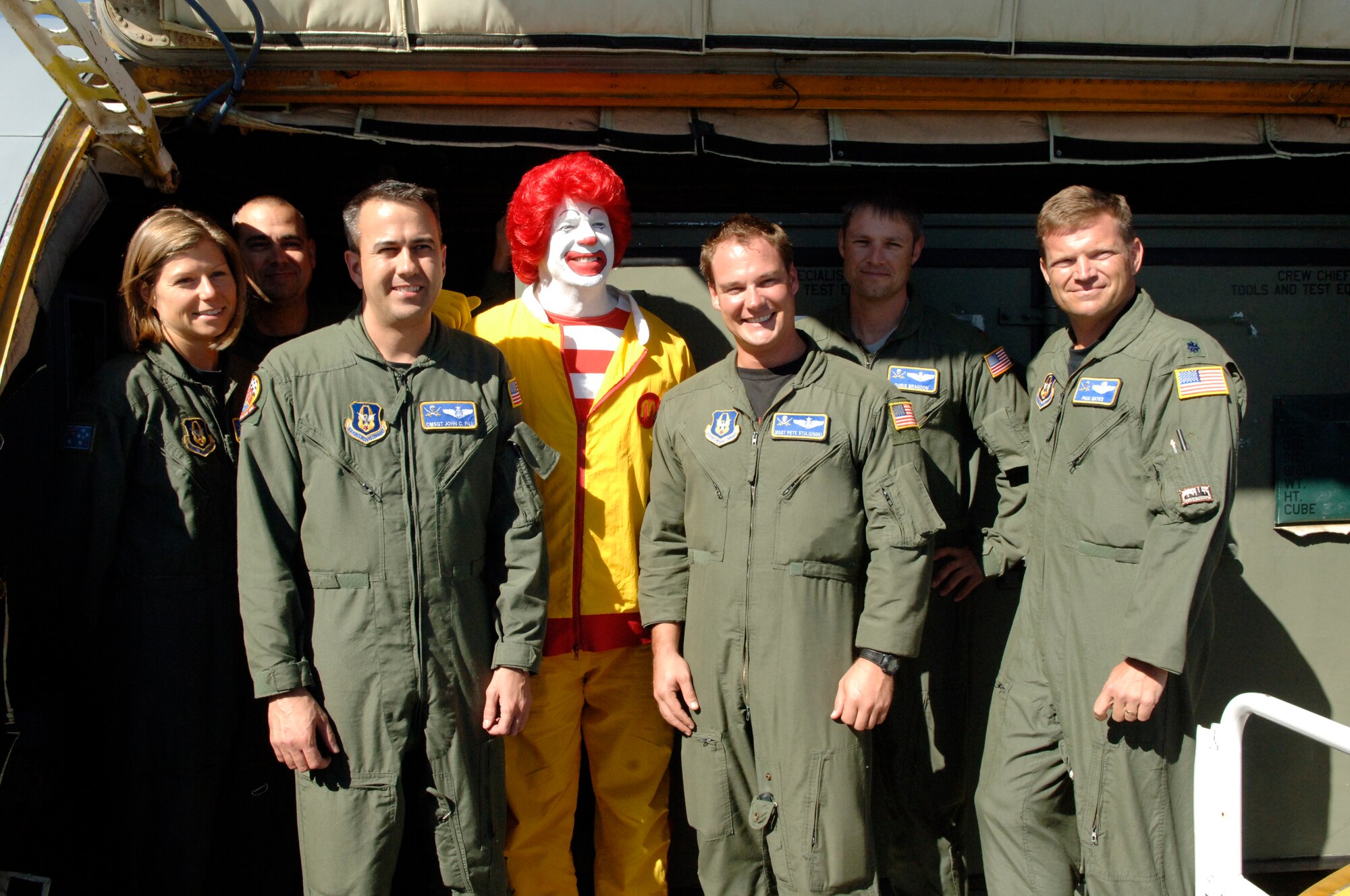 Reservists from the 927th Air Refueling Wing are welcomed home from deployment by Ronald McDonald on Jan. 2, 2010.  The troops were deployed to Guam in support of Operation Enduring Freedom.