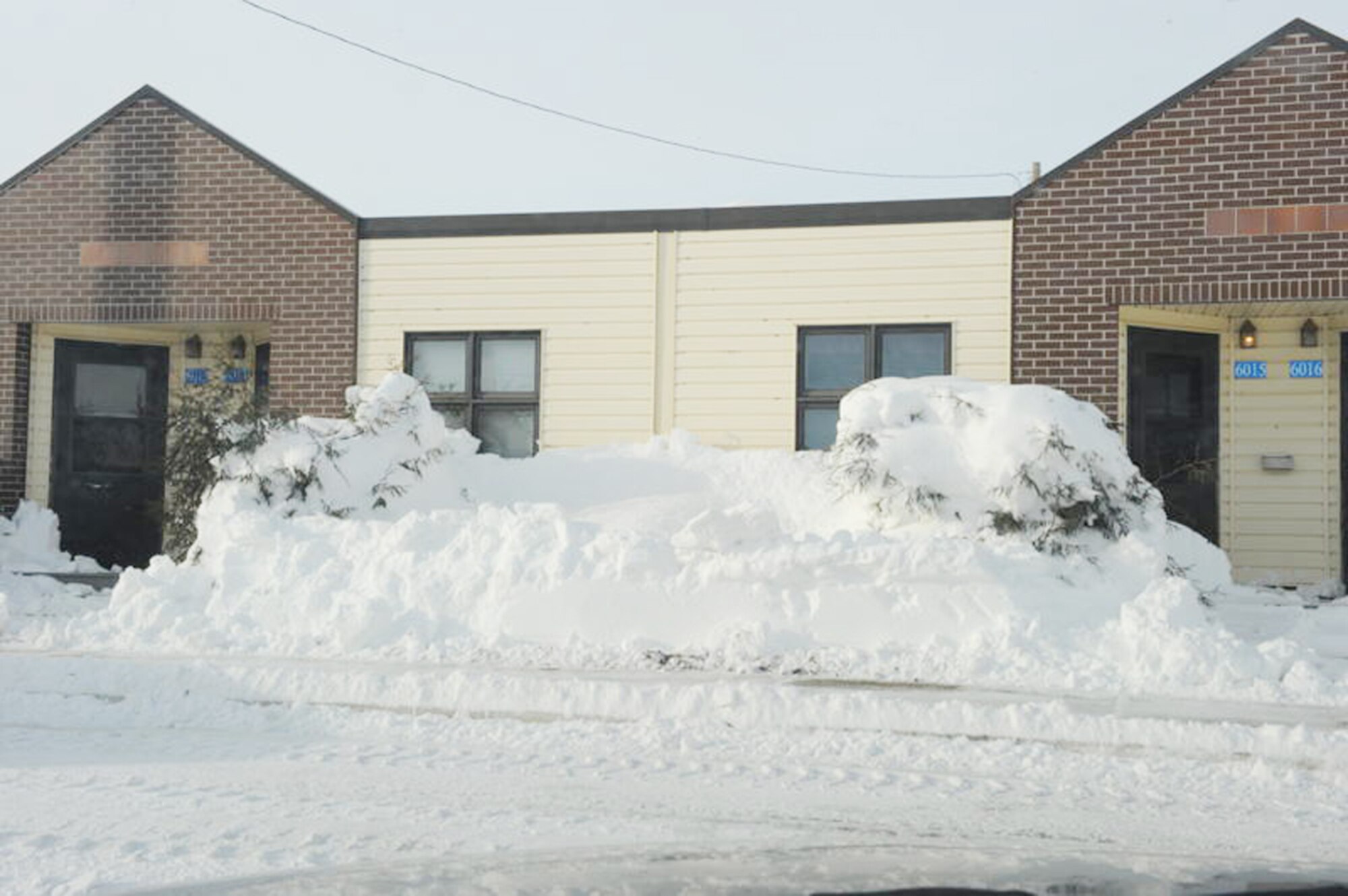 Snow piled up in front of the temporary lodging facility Dec. 29, 2009 at Minot Air Force Base, N.D. A Christmas weekend blizzard resulted in 25.7 inches of snow. (U.S. Air Force photo/Staff Sgt. Stacy Moless)