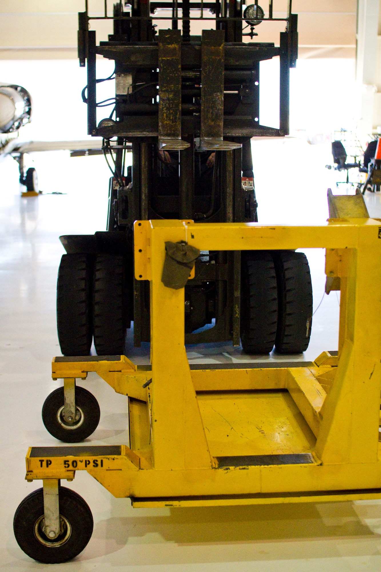 An engine stand and forklift are in position as they were Dec. 1 during a T-1A Jayhawk engine removal that went wrong. (U.S. Air Force photo/2nd Lt. Paul Whittaker)