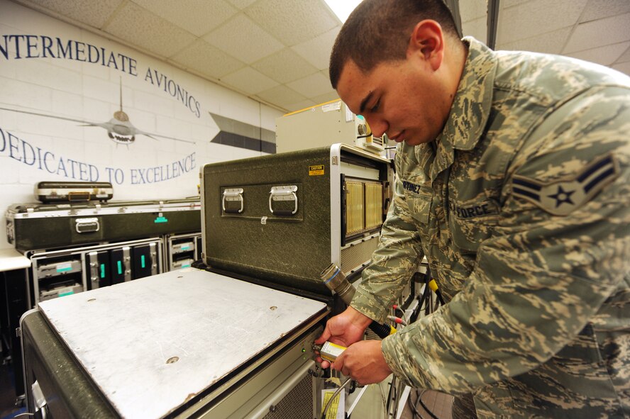 SHAW AIR FORCE BASE, S.C. -- Airman 1st Class Julian Martinez, an F-16 avionics technician with the 20th Component Maintenance Squadron, initiates a confidence test on the improved avionics intermediate station. (U.S. Air Force photo/Tech. Sgt. Louis Rivers)