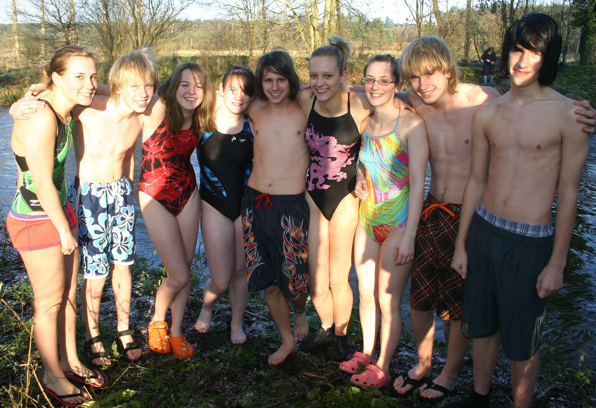 High school members of the Barracudas Swim Team posed for a picture before jumping into the cold waters of the Little Ouse River in Santon Downham, Suffolk, on a frosty New Year’s Day, Jan. 1. Members of the team and some of their parents, took part in the roughly 15-minute adventure which is an annual tradition for the team.  The Barracudas are part of the European Forces Swim League, which consists of elementary through high-school age swimmers from RAFs Lakenheath and Mildenhall.  The team competes against teams from across Europe.