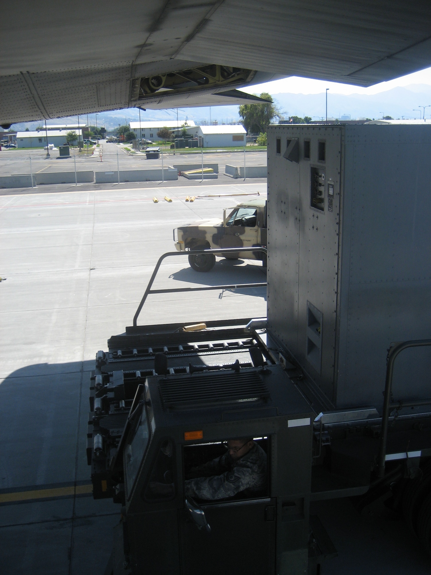 Senior Scout, a pallet-mounted communications and electronic intelligence system, is loaded onto a West Virginia Air National Guard C-130H3 Hercules aircraft, Aug. 17, 2009. The 130th Airlift Wing out of Charleston, W.Va. deployed to Salt Lake City, Utah for one month to participate in testing. The huge 4,500 cubic foot cargo area of the aircraft duplicates the volume of the standard American railroad box car. 
(U.S. Air Force photo by Master Sgt. Debbie Turrill/Released)