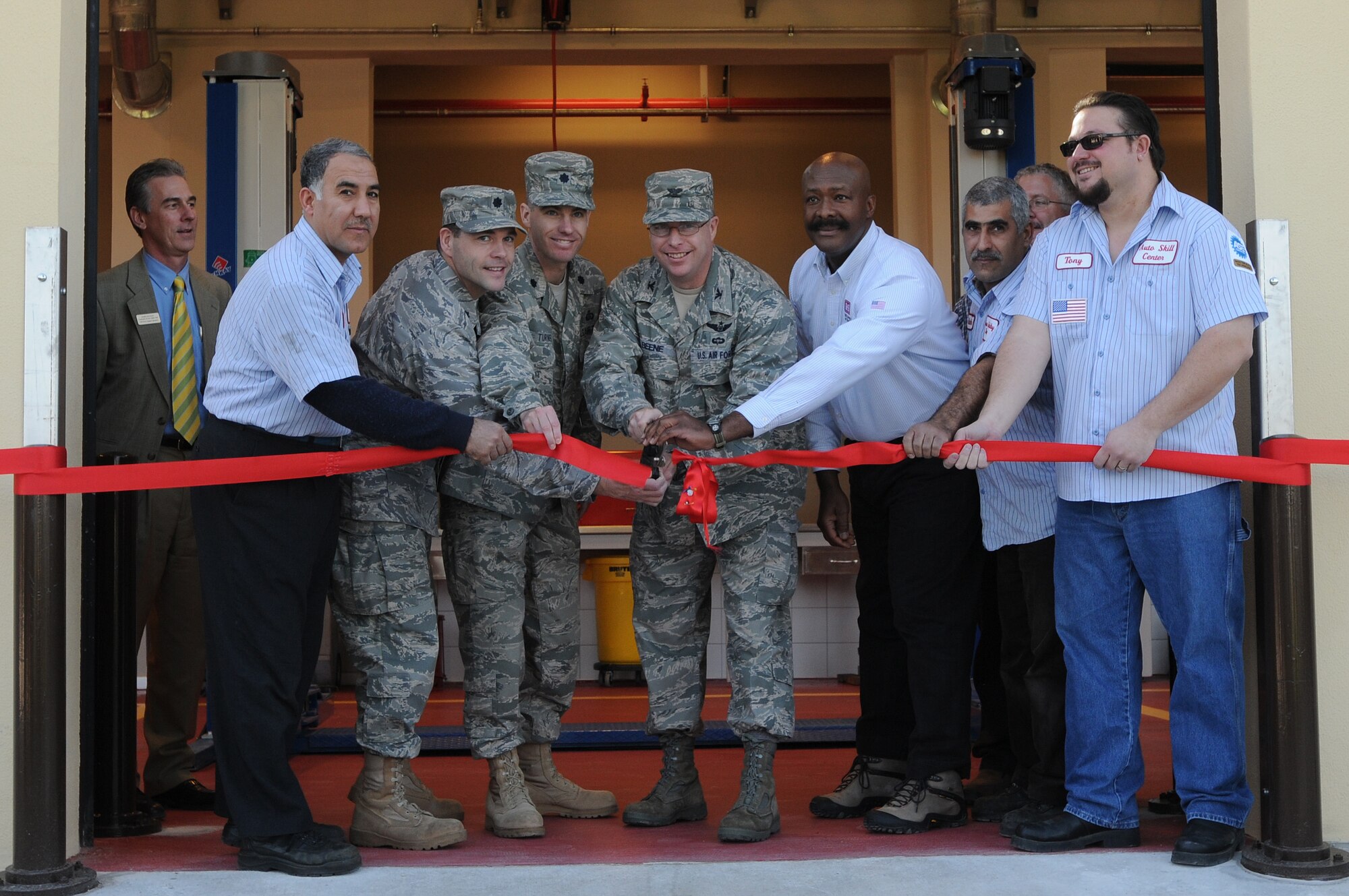 Col. Eric Beene, the 39th Air Base Wing commander, along with other wing leadership, open Incirlik’s new auto hobby shop with a ribbon-cutting ceremony Tuesday, Jan. 5, 2010.  The new Auto Hobby Shop is open for business Tuesday through Saturday from 9 a.m. to 5:30 p.m. with a public car wash available 24 hours a day.  (U.S. Air Force photo/Senior Airman Ashley Wood) 