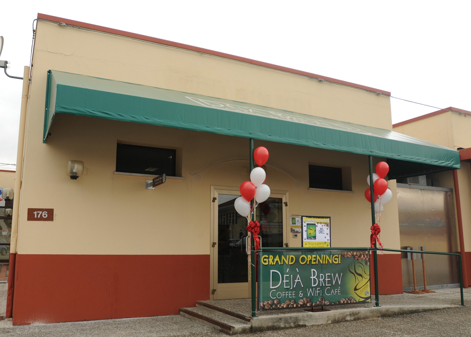 Deja Brew, located next to the Bowling Center in Area 1 of Aviano Air Base, Italy, opened Dec. 30, 2009 following a ribbon cutting ceremony.  The cafe seats up to 30 people and serves coffee, cheesecake, snacks, and assorted frozen drinks (caffeinated and non-caffeinated such as mango frozen drinks).  The cafe is open 6 a.m. to 5 p.m. Monday, 6 a.m. to 6 p.m. Tuesday thru Friday and 11 a.m. to 5 p.m. Saturday and Sunday.  (U.S Air Force photo/Airman LaVel D. Sterling)