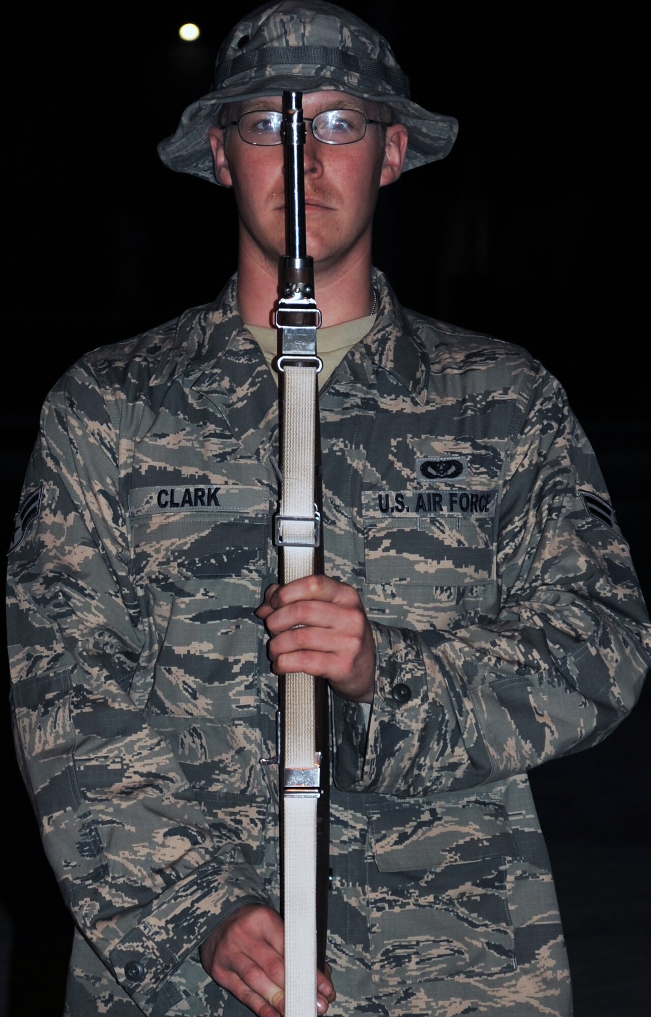 Airman 1st Class Ben Clark, an Airman assigned to the 380th Air Expeditionary Wing, practices for his participation in a deployed honor guard Jan. 5, 2009, at a non-disclosed location in Southwest Asia.  The deployed honor guard supports official ceremonies held by the wing.  The 380th AEW is comprised of four groups and 12 squadrons and the wing?s deployed mission includes air refueling, surveillance, and reconnaissance in support of overseas contingency operations in Southwest Asia. (U.S. Air Force Photo/Tech. Sgt. Scott T. Sturkol/Released)