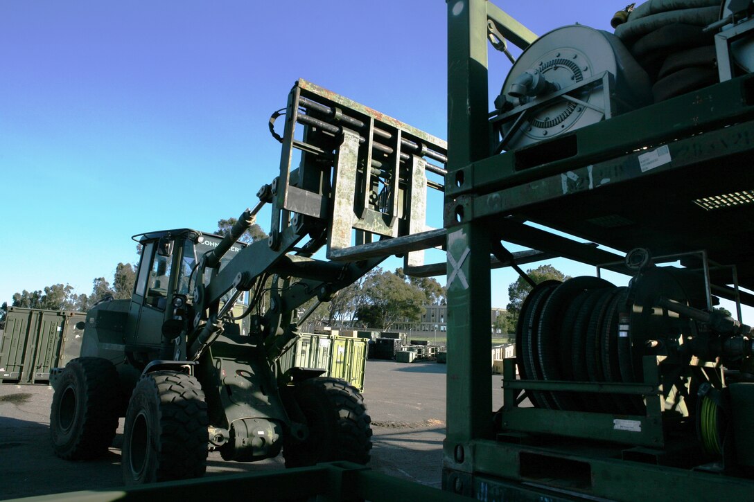 More than 100 service members from 1st Marine Logistics Group and other units throughout the base work together at the UMA under the Marine Air-Ground Task Force Deployment and Distribution Operations Center, I Marine Expeditionary Force to support the deployed troops.