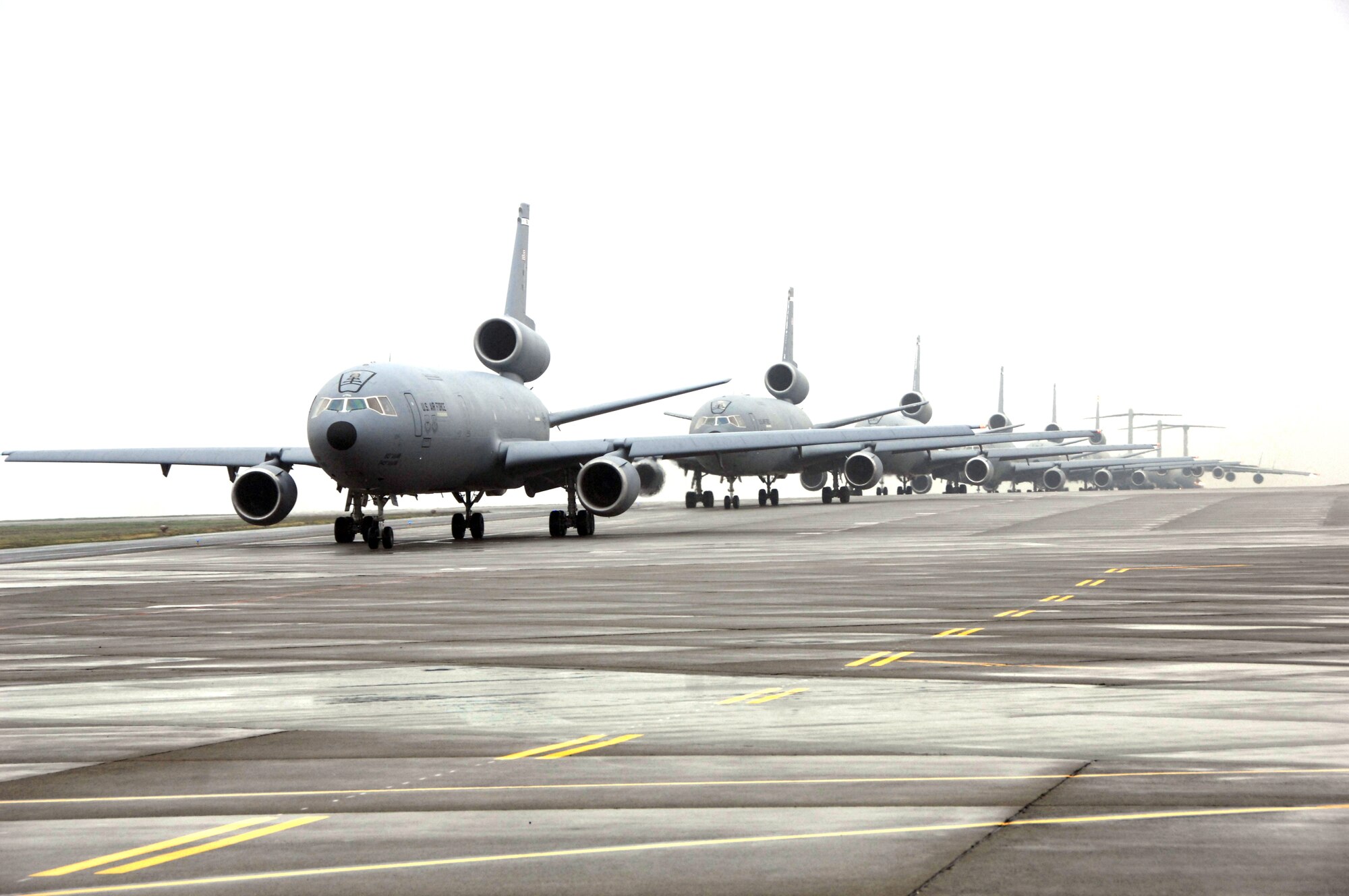 Aircraft prepare to take off Dec. 21 during Travis' first-ever mass launch of nine aircraft. The Total Force launch effort was an opportunity for operations, maintenance and support personnel to train together on a larger scale than normal. (U.S. Air Force photo/Amanda Lopez)