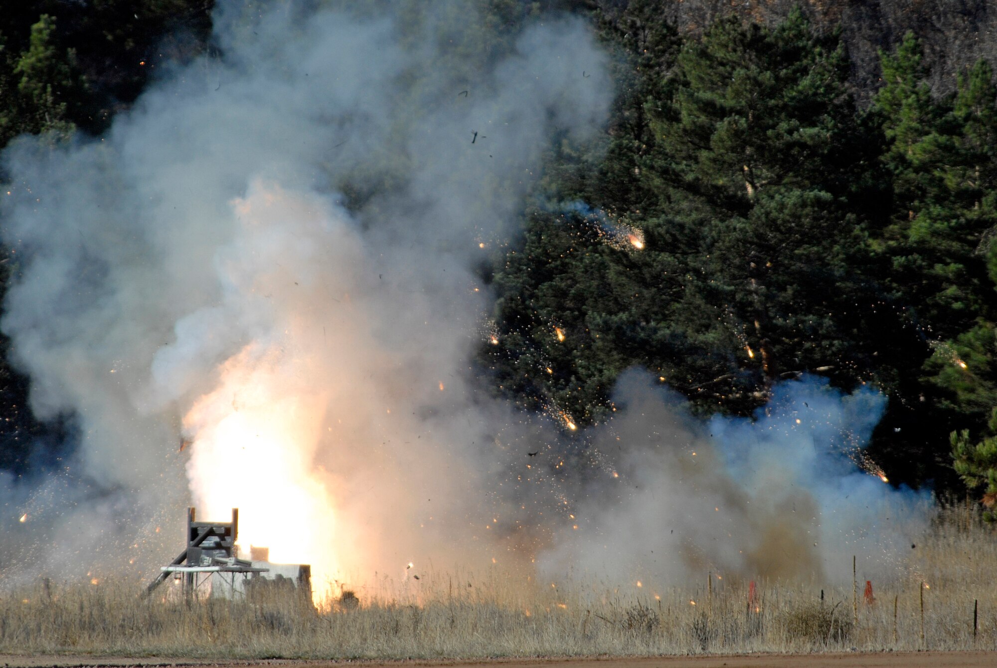 FalconLaunch-6 explodes during a static test fire at the Air Force Academy's Jacks Valley Nov. 4, 2009. The malfunction was traced to the placement of the igniter within the rocket. (U.S. Air Force photo/Mike Kaplan)
