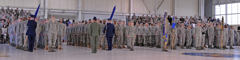 LANGLEY AIR FORCE BASE, Va. – Langley Airmen stand at attention as the 1st Medical Group and the 1st Mission Support Group retire their guidons during the 633d Air Base Wing activation and change-of-command ceremony. The activation of the 633d ABW is the first step in fulfilling congress’ 2005 Base Realignment and Closure decision that forms Joint Base Langley-Eustis later this month.(U.S. Air Force photo/Airman 1st Class John Teti)

