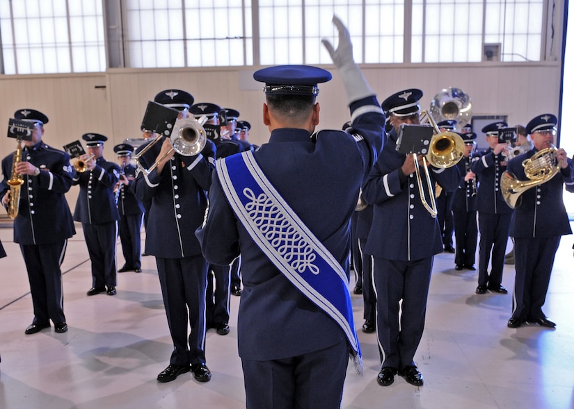 LANGLEY AIR FORCE BASE, Va. – The Air Force Heritage of America Band plays the National Anthem during the 633d Air Base Wing activation and change-of-command ceremony. The activation of the 633d ABW is the first step in fulfilling congress’ 2005 Base Realignment and Closure decision that forms Joint Bas Langley-Eustis later this month.(U.S. Air Force photo/Airman 1st Class John Teti)