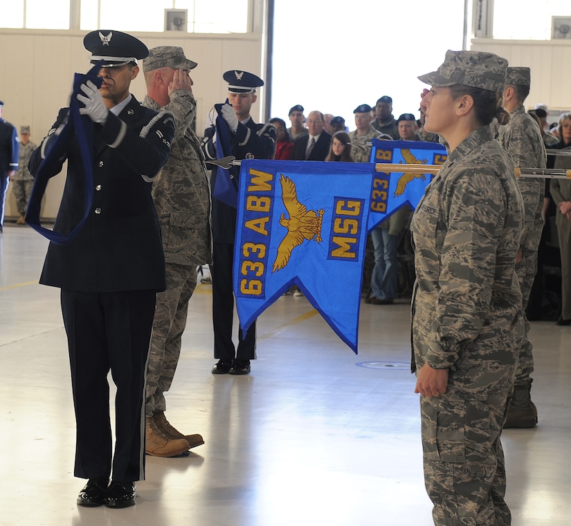 LANGLEY AIR FORCE BASE, Va. -- The 633d Medical Group and the 633d Mission Support Group receive their new guidons during the 633d Air Base Wing activation and change-of-command ceremony.  The activation of the 633d ABW is the first step in fulfilling congress' 2005 Base Realignment and Closure decision that forms Joint Base Langley-Eustis later this month. (U.S. Air Force photo/Senior Airman Zachary Wolf)
