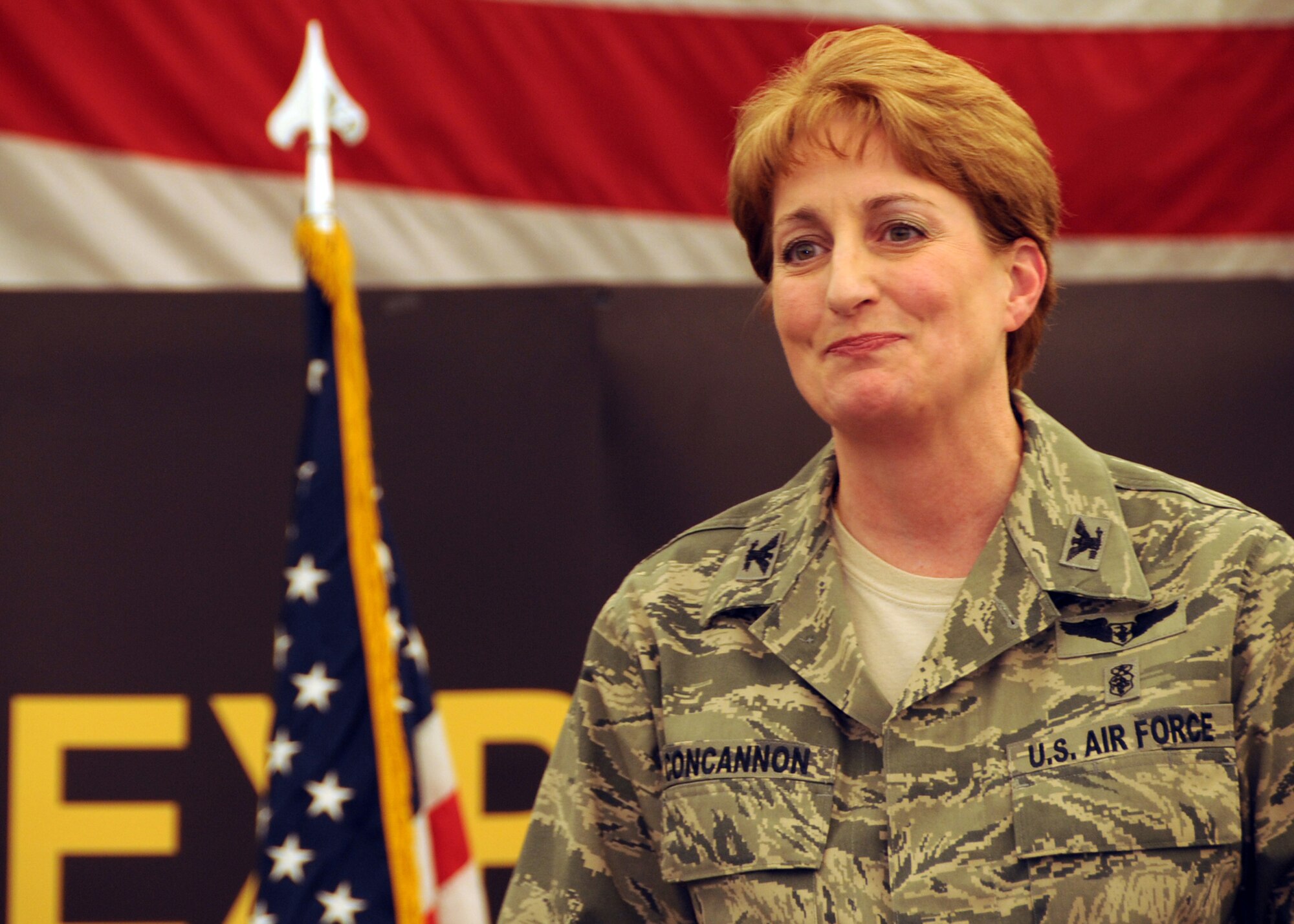 Col. Kathleen Concannon, commander of the 380th Expeditionary Medical Group at a non-disclosed location in Southwest Asia, talks to the audience after taking command of the group on Jan. 4, 2009. Colonel Concannon is deployed from the 319th Medical Group at Grand Forks Air Force Base, N.D. As the commander of the 380th EMDG, she is responsible for health care of more than 2,100 members assigned to the 380th Air Expeditionary Wing and U.S. Embassy personnel. Colonel Concannon also collaborates with host nation clinical facilities and hospitals for emergency, inpatient and outpatient medical and dental care. (U.S. Air Force Photo/Senior Airman Jenifer Calhoun/Released)