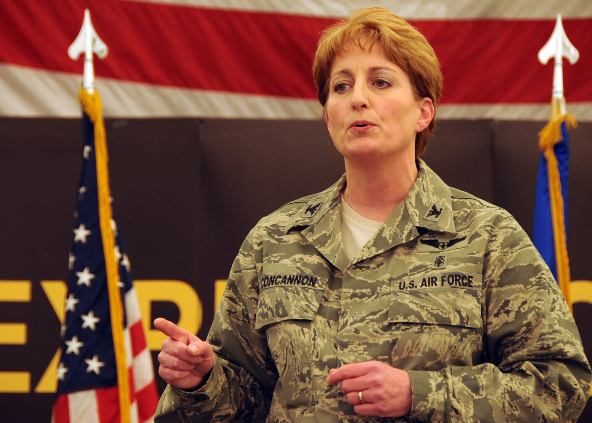 Col. Kathleen Concannon, commander of the 380th Expeditionary Medical Group at a non-disclosed location in Southwest Asia, talks to the audience after taking command of the group on Jan. 4, 2009. Colonel Concannon is deployed from the 319th Medical Group at Grand Forks Air Force Base, N.D. As the commander of the 380th EMDG, she is responsible for health care of more than 2,100 members assigned to the 380th Air Expeditionary Wing and U.S. Embassy personnel. Colonel Concannon also collaborates with host nation clinical facilities and hospitals for emergency, inpatient and outpatient medical and dental care. (U.S. Air Force Photo/Senior Airman Jennifer Calhoun/Released)