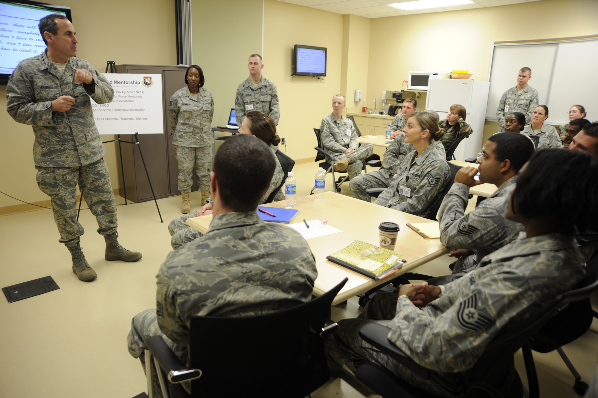 Gen. Raymond E. Johns, Air Mobility Command, commander, speaks to Non commissioned Officers at the 6th Medical Group Jan. 6, 2010, about the importance of mentoring Airmen at MacDill Air Force Base, Fla. General Johns took command of AMC Nov. 20. Since then he has made it a top priority to see the air mobility mission "through the eyes of the Airmen."  (US Air Force Photo By: Senior Airman Angela Ruiz)(Released)