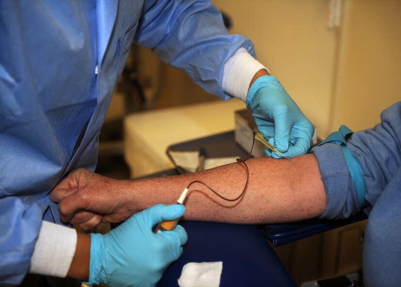 Staff Sgt. Adrienne Antonios, 4th Medical Operations Squadron medical lab technician, draws blood from a patient on Seymour Johnson Air Force Base, N.C., Jan. 5, 2010. Members of the 4th MDOS lab collect blood from more than 1500 patients a month. (U.S. Air Force photo/Senior Airman Ciara Wymbs) 