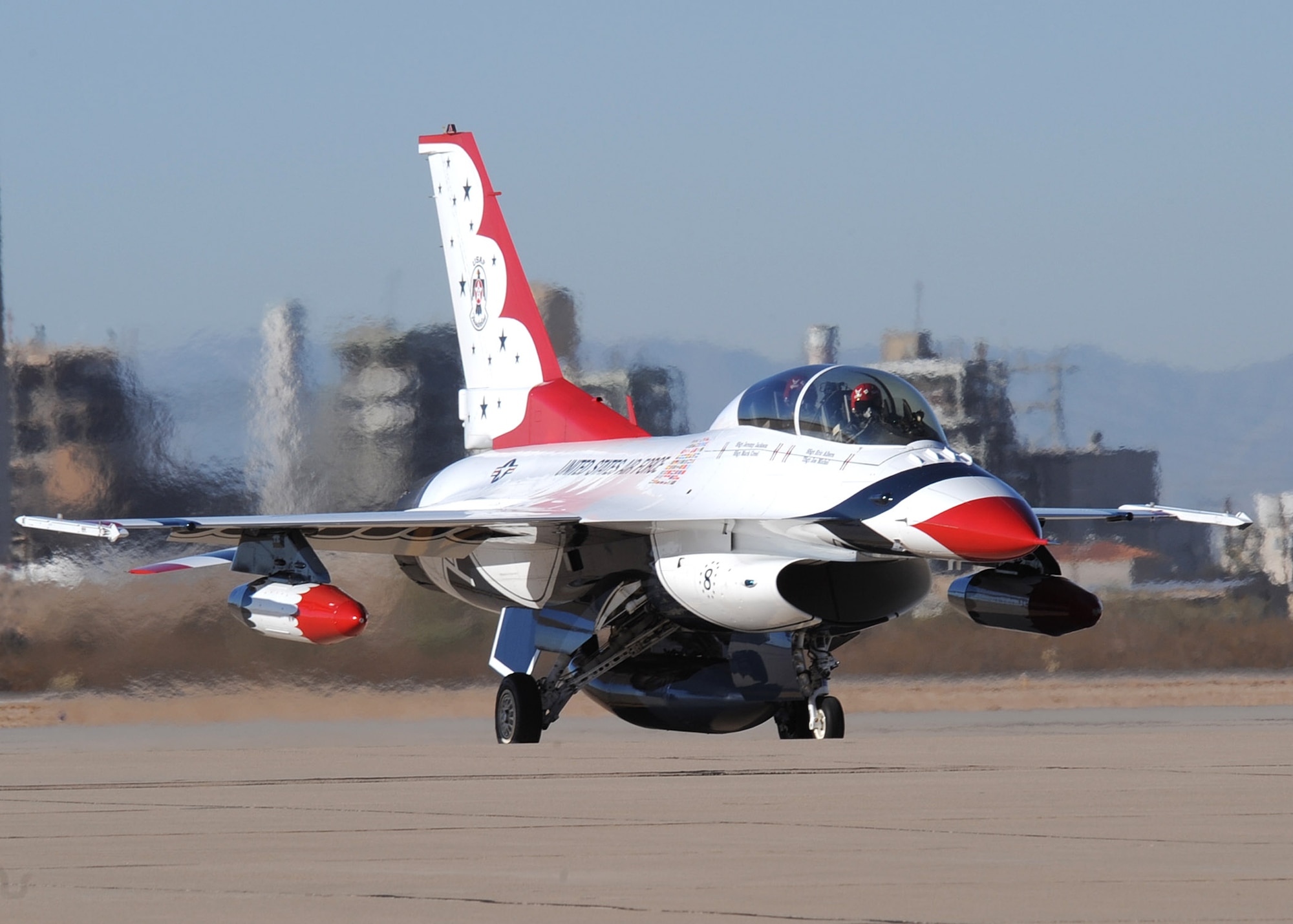 Maj. John Gallemore, advance pilot and narrator for the U.S. Air Force Air Demonstration Squadron “Thunderbirds,” taxis down the flight line here Jan. 5. During his one-day visit, Major Gallemore conducted a site survey in preparation for the Thunderbirds performances at D-M March 20-21. Major Gallemore flies the team’s No. 8 jet, which is an F-16 Fighting Falcon, Block 52. D-M will host the Thunderbirds first performance of their 57th season, which will bring them to more than 65 shows in 27 states and Canada, representing more than 700,000 Airmen, Air Force Reserve, Air National Guard and civilians. The theme of this year's show is "Davis-Monthan: Tucson Pride, Air Force Power." The Thunderbirds are based out of Nellis Air Force Base, Nev. For more information about the air show, go to www.dm.af.mil and to learn more about the Thunderbirds go to http://thunderbirds.airforce.com/index.html. (U.S. Air Force Photo By/Staff Sgt. Jacqueline Romero