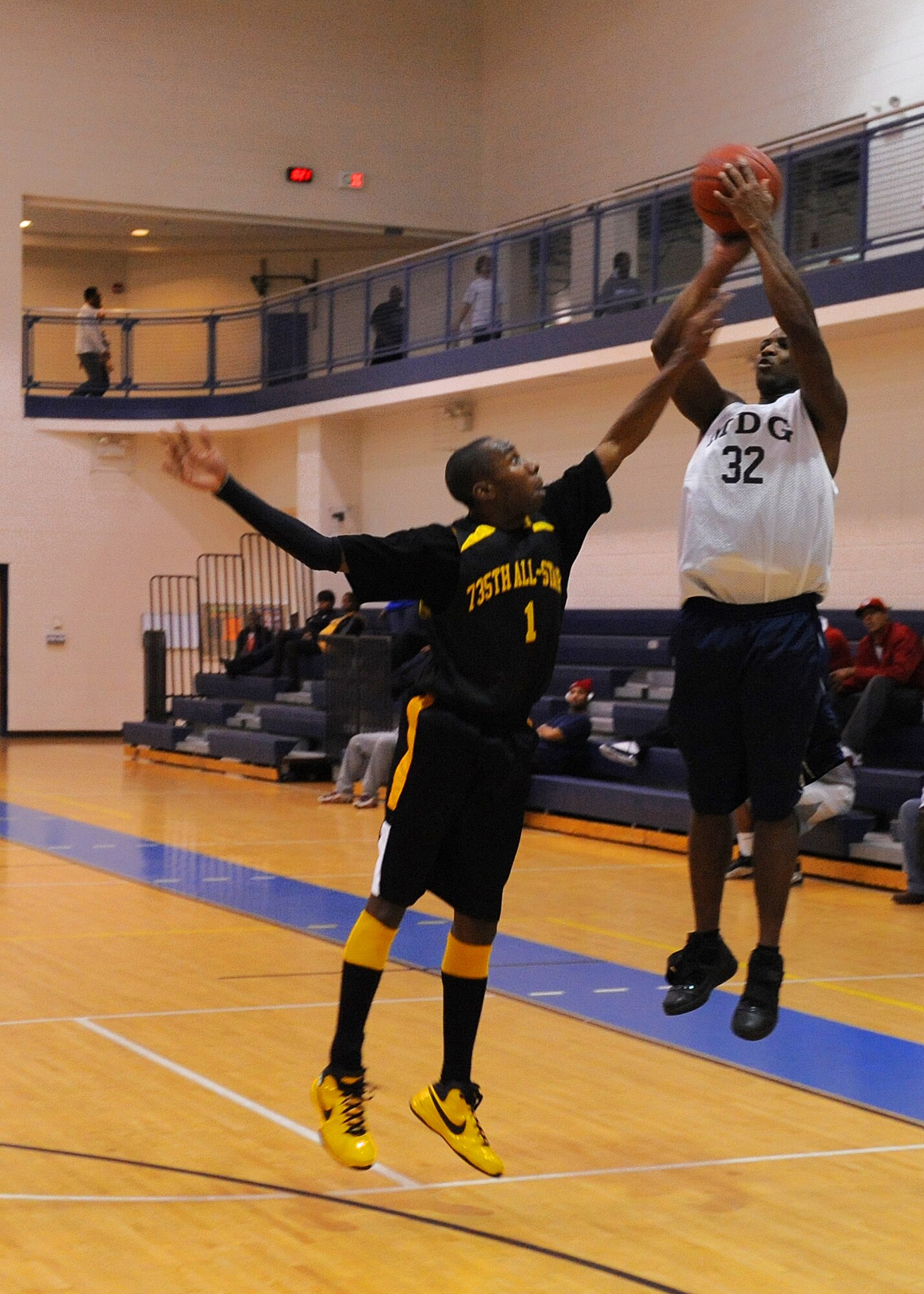 LANGLEY AIR FORCE BASE, Va. – Cornelius Young, 633d Medical Group, attempts a three-point shot in an intramural basketball game against the 735th Supply Chain Management Group Jan. 7 at the Shellbank Fitness Center. The 633d MDG won the game 48-27. (U.S. Air Force photo/Airman 1st Class John Teti)
