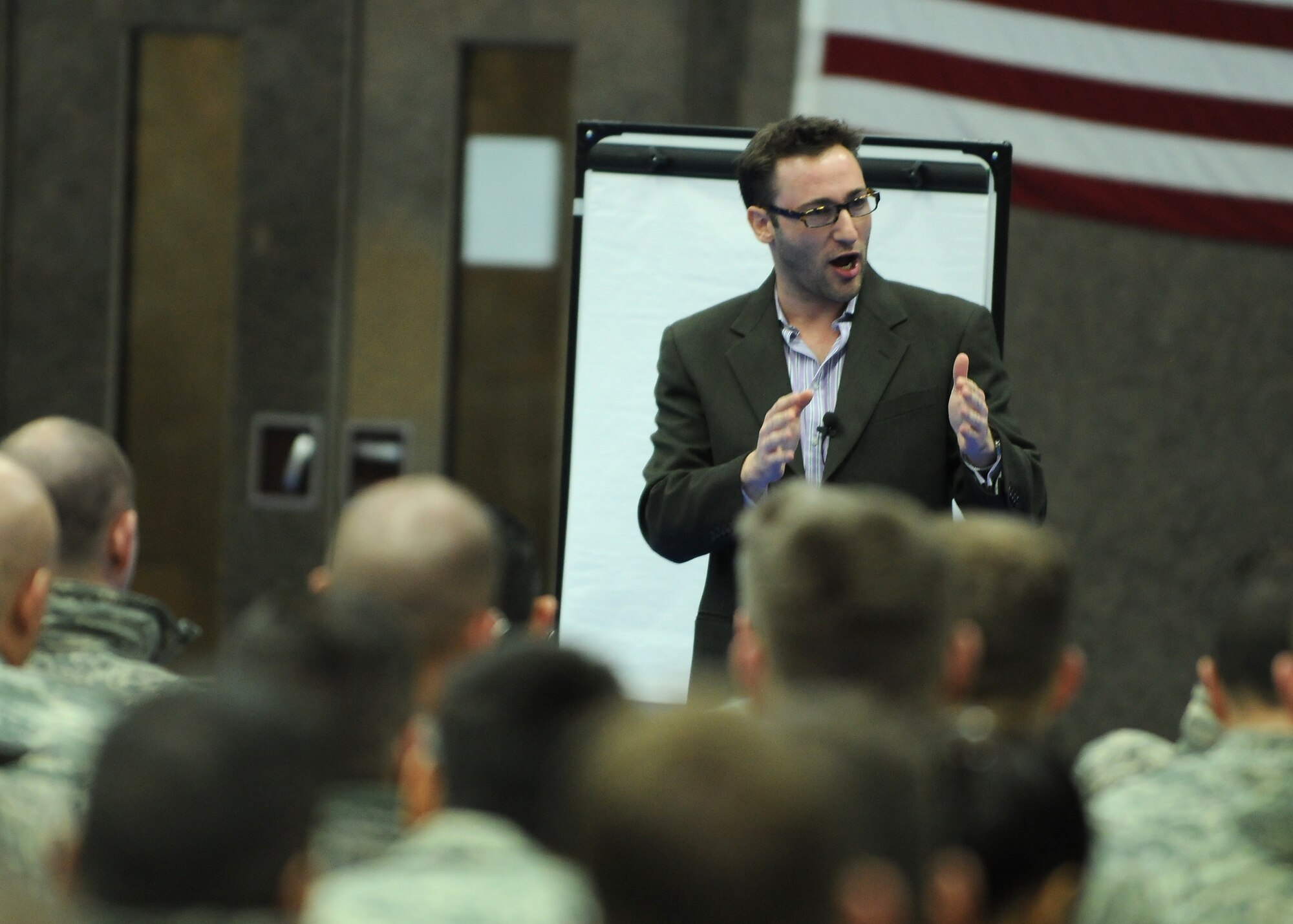SPANGDAHLEM AIR BASE, Germany -- Simon Sinek, motivational speaker and author, speaks with members of the 52nd Fighter Wing during his visit here Jan. 7. Mr. Sinek developed the “The Golden Circle,” a concept that helps organizations to inspire people to buy or support any product, company or idea. (U.S. Air Force photo/Senior Airman Nathanael Callon) 