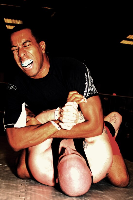 Darnell Mason, a contender with Fight Club 29, struggles to win his second bout against Ryan Delaney during the Grappling Experience Tournament in Las Vegas Jan. 9. Mason won the match, and earned a bronze medal in the 165-pound Masters Division.