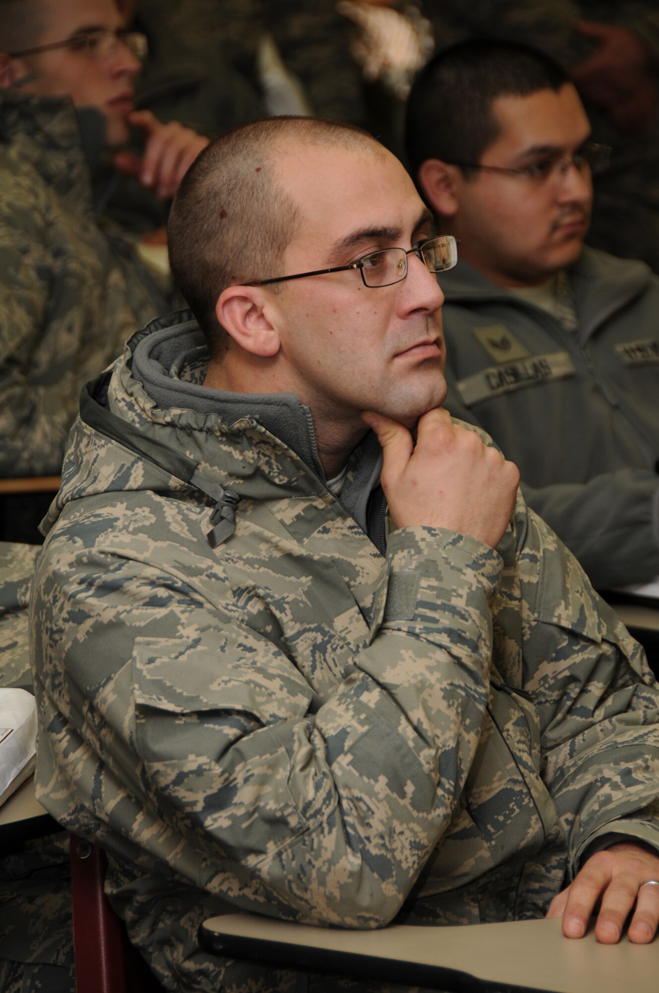 Tech Sgt. Keelan Hunt, a member of the 188th Fighter Wing, listens to an Intel briefing Jan. 4, 2010. The 188th deployed approximately 50 Airmen to Afghanistan for a four-month Aerospace Expeditionary Force (AEF) rotation. The remainder of the 188th personnel, approximately 250, will begin its portion of the rotation in March 2010, when the 188th's official rotation begins. (U.S. Air Force photo by Tech. Sgt. Stephen Hornsey)