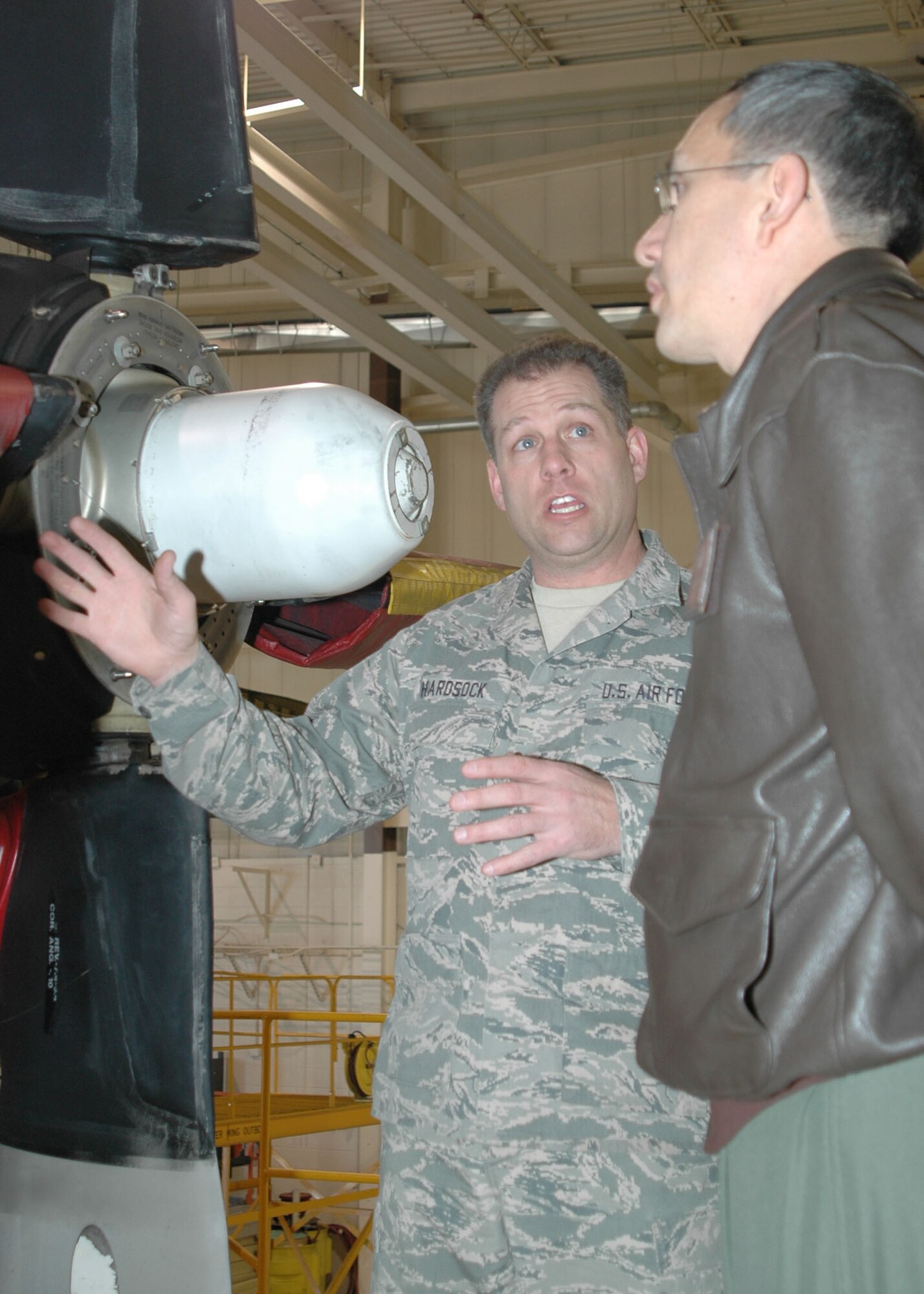 Master Sgt. Jeffrey Hardsock, 302nd Maintenance Squadron, identifies maintenance issues with Lt. Col. Chris Cantu Jan. 8 at Peterson Air Force Base, Colo. Colonel Cantu, acting commander for the 19th Operations Group based at Little Rock AFB, Ark., visited the Air Force Reserve's 302nd Airlift Wing at Peterson to get a better look at operations and maintenance personnel and the challenges they face as they continue to integrate with Active Duty Airmen of the 52nd Airlift Squadron. Both the squadron and the 302nd AW have combined under Total Force Integration to make effective use of C-130 Hercules aircraft in support of Air Force objectives. (U.S. Air Force photo/Staff Sgt. Stephen J. Collier)