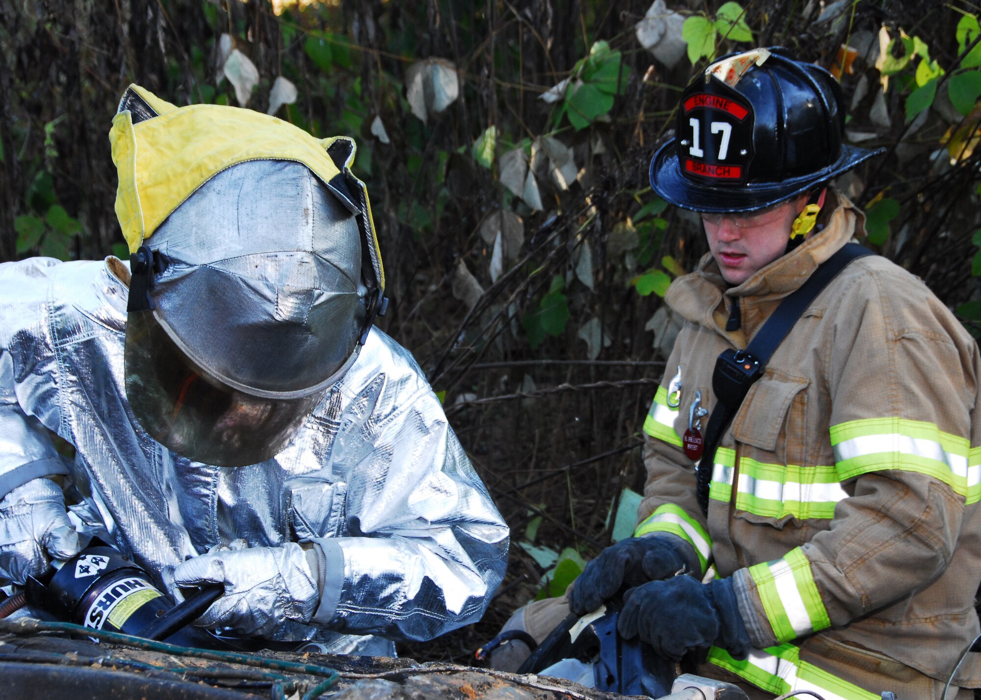 Charlotte Air National Guard Base, NC -- Emergency responders from the North Carolina National Guard assigned to the 145th Civil Engineering Squadron work with responders from the Charlotte, NC Fire Department to stabilize a vehicle during a simulation exercise here October 8.  The North Carolina Air National Guard responds to in-state emergencies, EMAC designated contingencies and federal instances of homeland defense.  The unit currently has members deployed I support of Operations Enduring Freedom and Iraqi Freedom and continues to support the War on Terror.
Photo by Staff Sgt Richard Kerner, 145th AW Public Affairs