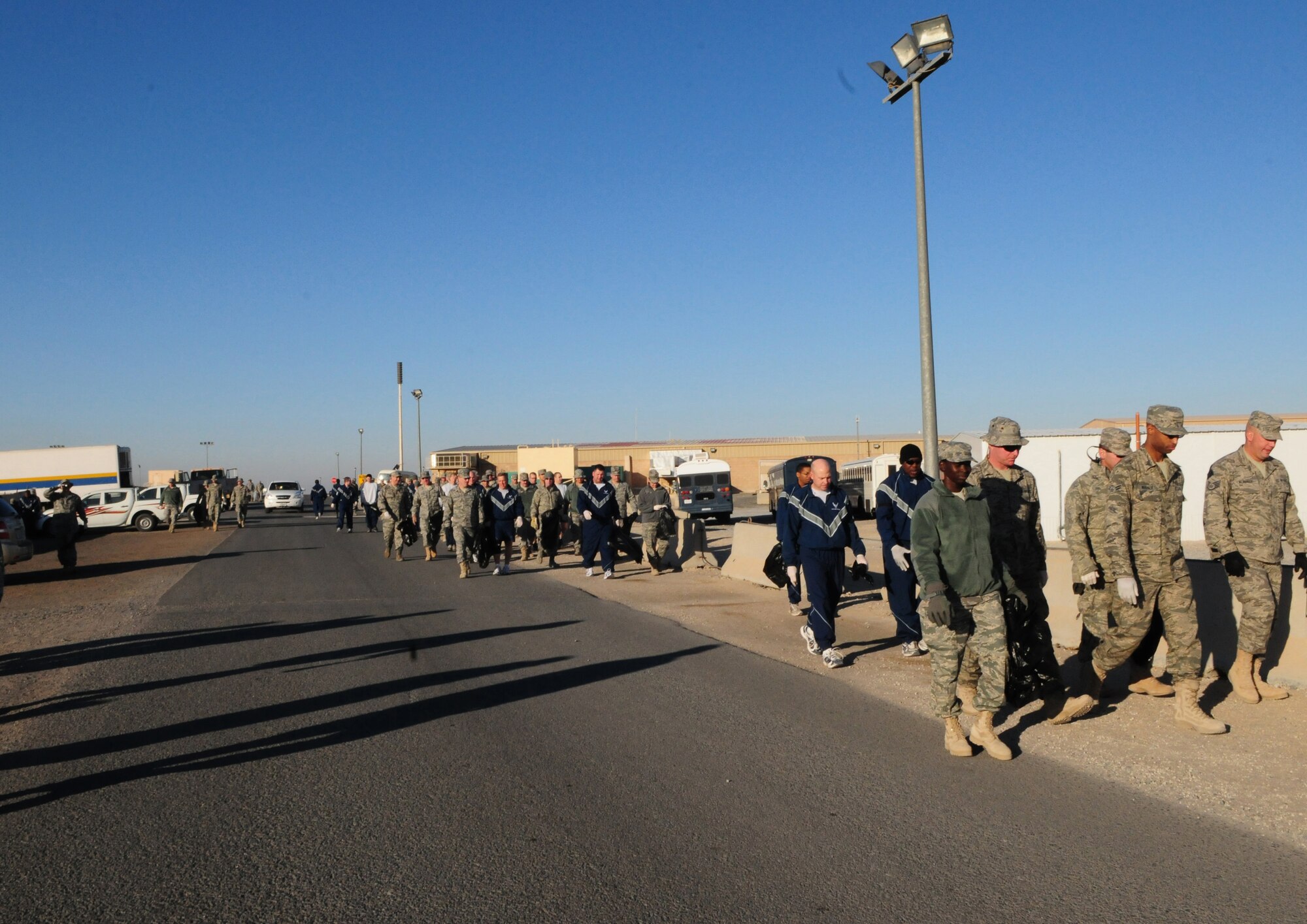 SOUTHWEST ASIA -- Members of the 386th Air Expeditionary Wing spend their morning cleaning up "the Rock", an air base in Southwest Asia, Jan. 9, 2010. The volunteer-based event is held every Saturday morning. (U.S. Air Force photo by Staff Sgt. Lakisha A. Croley/Released)