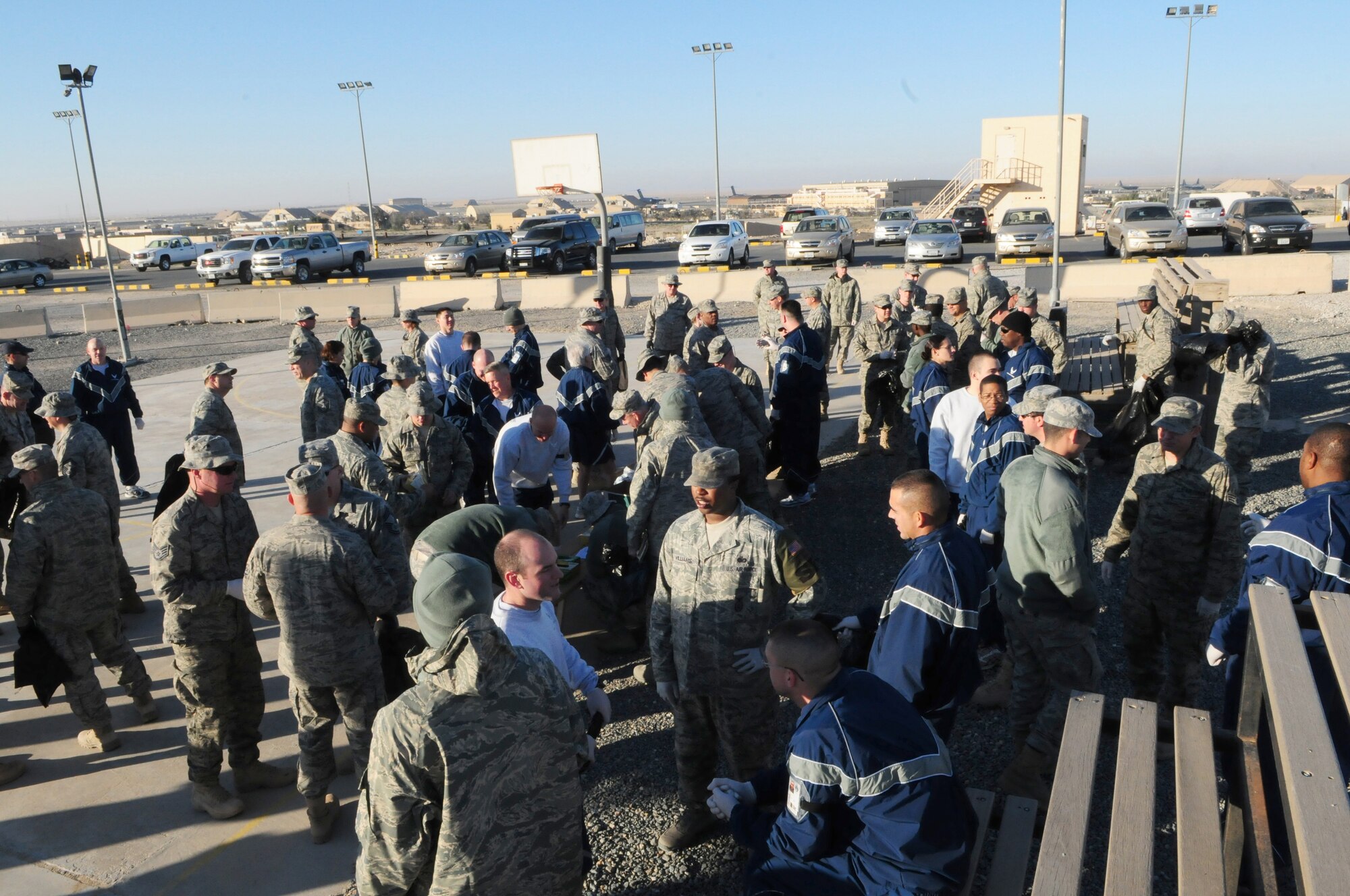 SOUTHWEST ASIA -- AIrmen of the 386th Air Expeditionary Wing spend their morning cleaning up an air base in Southwest Asia Jan. 9, 2010. The volunteer-based event is held every Saturday morning. (U.S. Air Force photo by Staff Sgt. Lakisha A. Croley/Released)