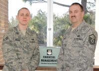 Senior Airman Trey Brock and Master Sgt. Randy Merritt, 919th Special Operations Wing financial management, won Air Force Reserve Command FM awards for  2009.  Airman Brock won the Financial Management Airman of the Year Award, while Sergeant Merritt won the Senior NCO of the Year.  Tech. Sgt. Diana Kendall, (not pictured) won AFRC FM NCO of the year.  U.S. Air Force photo by Tech. Sgt. Samuel King Jr.