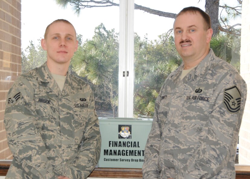 Senior Airman Trey Brock and Master Sgt. Randy Merritt, 919th Special Operations Wing financial management, won Air Force Reserve Command FM awards for  2009.  Airman Brock won the Financial Management Airman of the Year Award, while Sergeant Merritt won the Senior NCO of the Year.  Tech. Sgt. Diana Kendall, (not pictured) won AFRC FM NCO of the year.  U.S. Air Force photo by Tech. Sgt. Samuel King Jr.