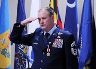 Chief Master Sgt. Lyle Spangler gives a final salute to the crowd ending his retirement ceremony and a 36-year career at Duke Field, Jan. 9.  Chief Spangler began his career in 1973 and transitioned to the reserves in 1978.  The chief completed his career as a member of the 711th Special Operations Squadron.  U.S. Air Force photo by Tech. Sgt. Samuel King Jr.