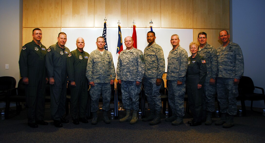 North Carolina Air and Army National Guard leadership,inside the new facility at the New London, N.C. Air National Guard base. Photo by Tech. Sgt. Brian E. Christiansen, 145th AW Public Affairs