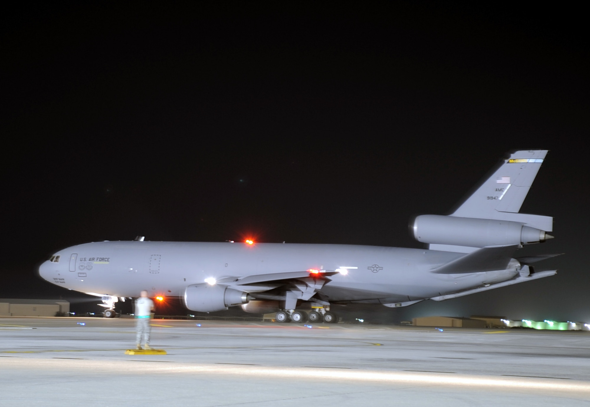 A KC-10 Extender assigned to the 908th Expeditionary Air Refueling Squadron, 380th Air Expeditionary Wing, waits to taxi on the flightline at a non-disclosed base in Southwest Asia on Jan. 10, 2010.  The KC-10 is one of the airframes in the U.S. Central Command area of responsibility that provides air refueling capability to provide global reach for overseas contingency operations.  (U.S. Air Force Photo/Tech. Sgt. Scott T. Sturkol/Released)
