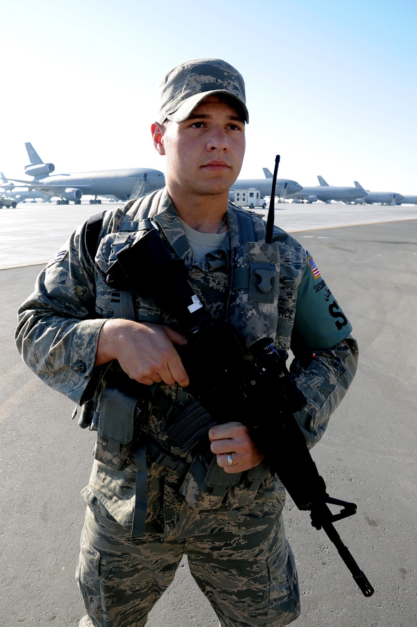 Airman 1st Class Andrew Opel, 380th Expeditionary Security Forces Squadron, watches over the flightline at a non-disclosed base in Southwest Asia on Jan. 8, 2010.  The 380th ESFS and the 380th Air Expeditionary Wing support Operations Iraqi Freedom and Enduring Freedom and the Combined Joint Task Force-Horn of Africa.  Airman Opel is deployed from the 96th Security Forces Squadron at Eglin AFB, Fla., and his hometown is Cumberland, Md. (U.S. Air Force Photo/Tech. Sgt. Scott T. Sturkol/Released)