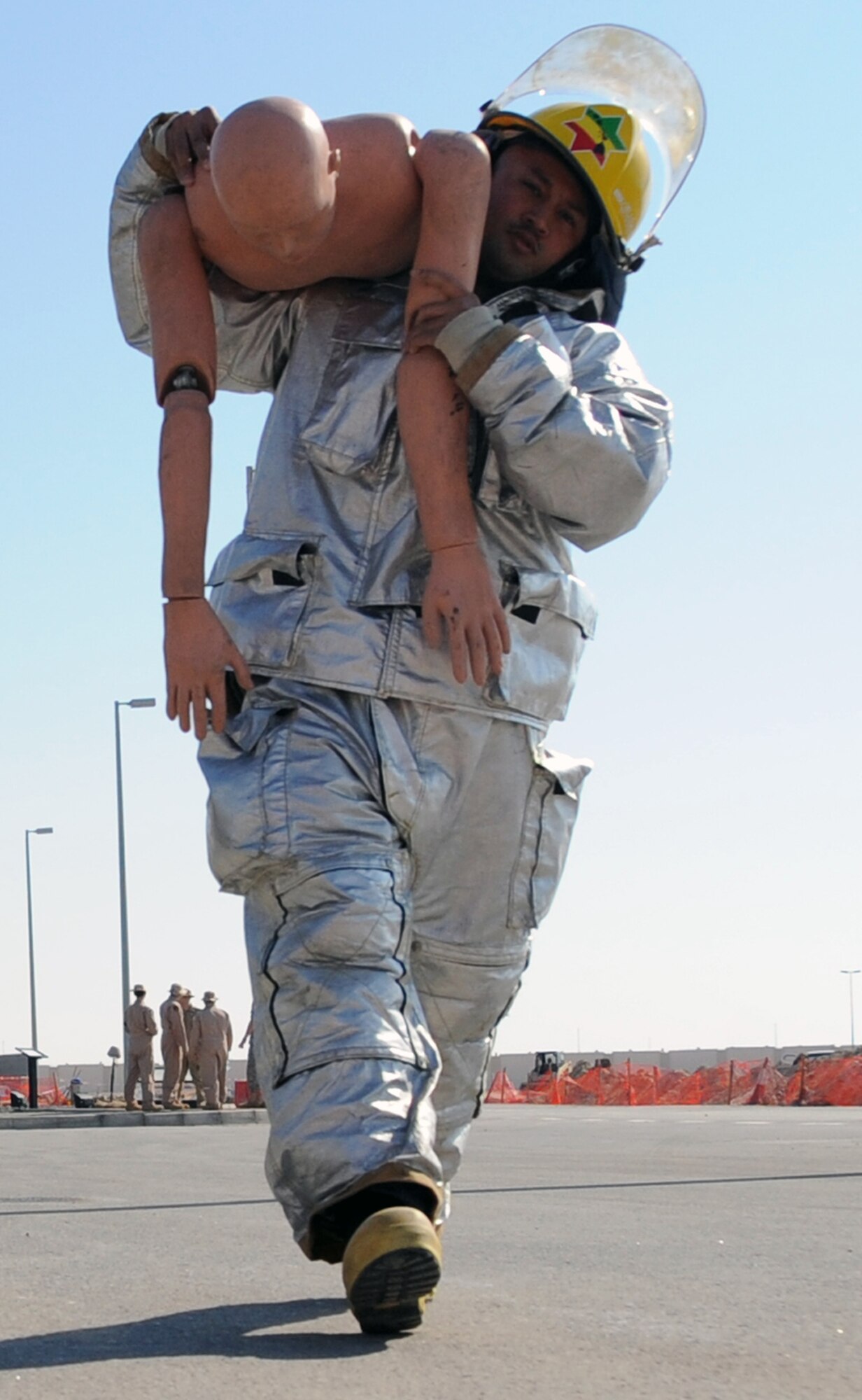 Airman 1st Class Justin T. Rellin, an Air Force firefighter deployed from the 18th Civil Engineer Squadron at Kadena Air Base, Japan, works in the 380th Expeditionary Civil Engineer Squadron's fire department at a non-disclosed base in Southwest Asia.  Airman Rellin was named the 380th Air Expeditionary Wing's "Warrior of the Week" for Jan. 6-12, 2010.  (U.S. Air Force Photo/Senior Airman Jenifer Calhoun/Released) 