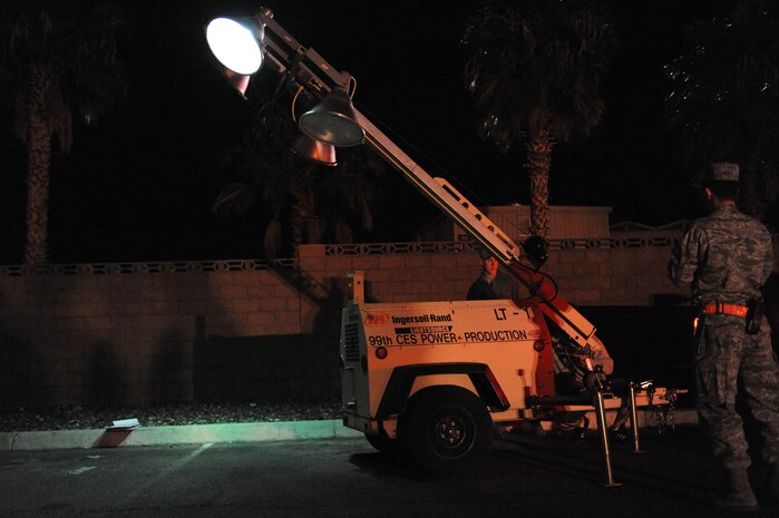 NELLIS AIR FORCE BASE, Nev. -- Airmen from the 99th Logisitics Readiness Squadron prepare cargo to deploy overnight at the deployment center during an operational readiness exercise Dec. 21. The 99th ABW is preparing for an operation readiness inspection Jan 25-29. (U.S. Air Force photo by Airman 1st Class Bret Clashman)
