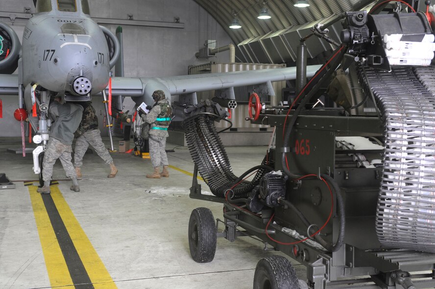 51st Maintenance Squadron Airmen perform pre-flight checks on an A-10 aircraft in a 25th Fighter Squadron hangar during Exercise Beverly Bulldog 10-01 on Osan Air Base, Republic of Korea Jan. 11. (U.S. Air Force photo/Senior Airman Stephenie Wade)
