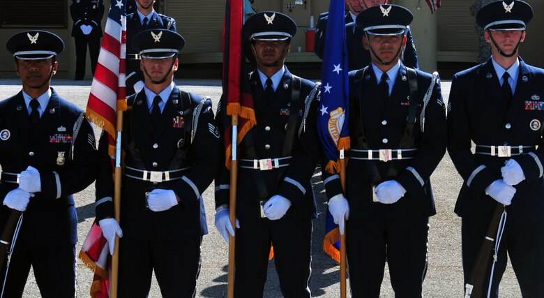 ANDERSEN AIR FORCE BASE, Guam - Members of the Andersen Honor Guard prepare to welcome Secretary of the Air Force Michael Donley at the 734th Air Mobility Command terminal Dec. 21. This is one of many details, including changes of command and funerals for active duty Airmen, retirees and veterans, performed by the Honor Guard. U.S. Air Force photo by Airman 1st Class Julian North)