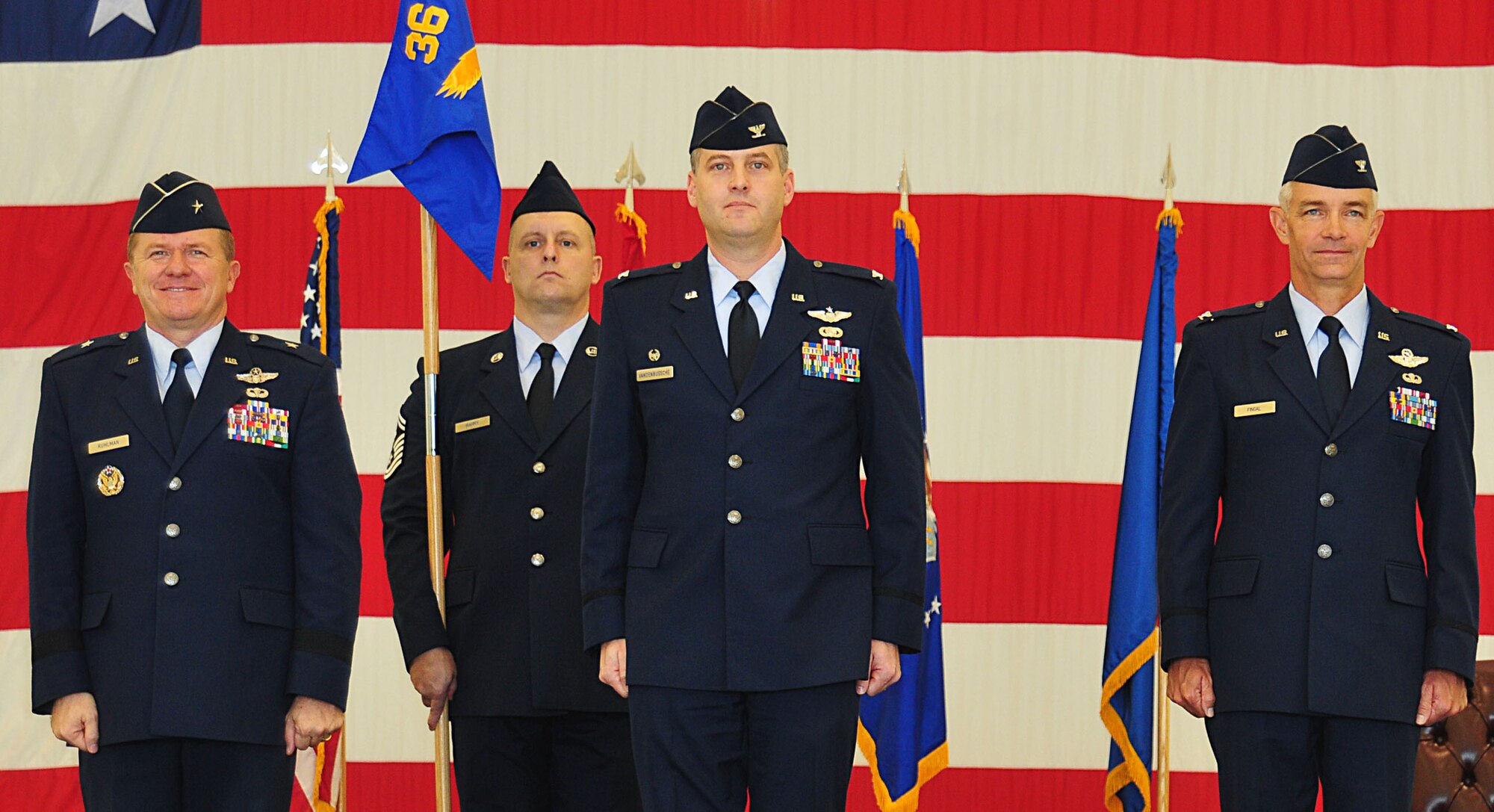 ANDERSEN AIR FORCE BASE, Guam - Col. Jeff Vandenbussche assumes command of the 36th Operations Group from General Phil Ruhlman, 36th Wing commander, in Hangar 6 on Jan. 11. Colonel Vandenbussche took over command from the 36th Wing Vice Commander Colonel Tod Fingal, who was serving in both roles.  (U.S. Air Force photo by Airman 1st Class Julian North)