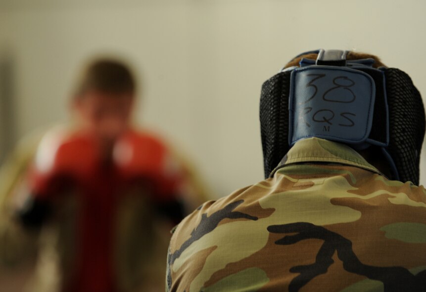 MOODY AIR FORCE BASE, Ga. -- Senior Airman Jared Stidham, 38th Rescue Squadron pararescueman, steps onto the mat to perform a hand-to-hand combat drill with Senior Airman Joseph Dittmer, 347th Operations Support Squadron Survival, Evasion, Resistance, and Escape specialist, during Modern Army Combatives Program training here Jan. 7. It is mandatory for all pararescuemen to be certified in level one of the MAC-P. (U.S. Air Force photo by Airman 1st Class Benjamin Wiseman)