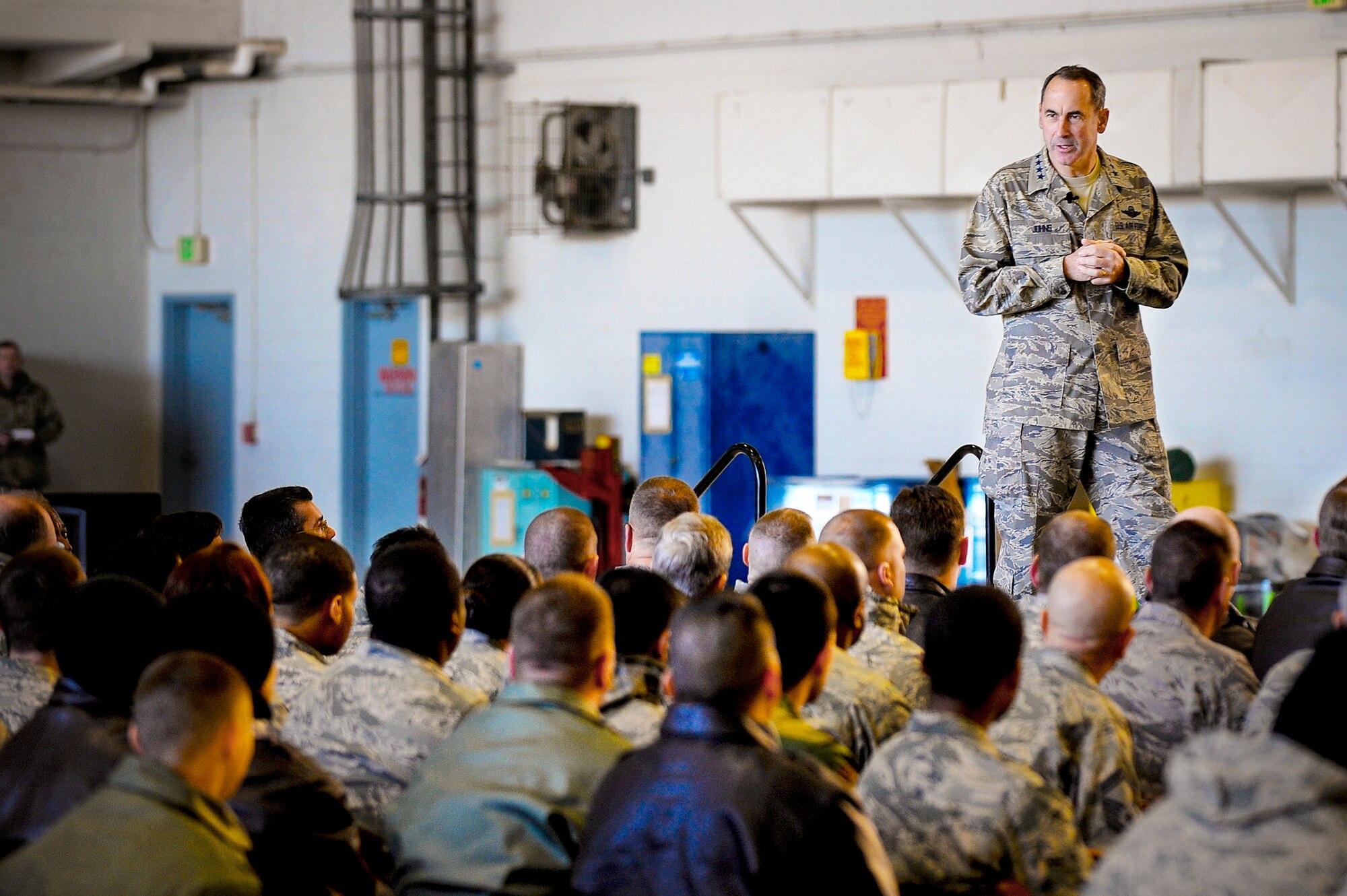 Gen. Raymond E. Johns Jr., speaks to the Airmen of the 6th Air Mobility Wing and the 927th Air Refueling Wing during a "all call" Jan. 7, 2010, at MacDill Air Force Base, Fla. General Johns visited MacDill AFB for the first time since taking over command of AMC on Nov. 20, 2009. General Johns is the commander of Air Mobility Command. (U.S. Air Force photo/Staff Sgt. Joseph L. Swafford Jr.)
