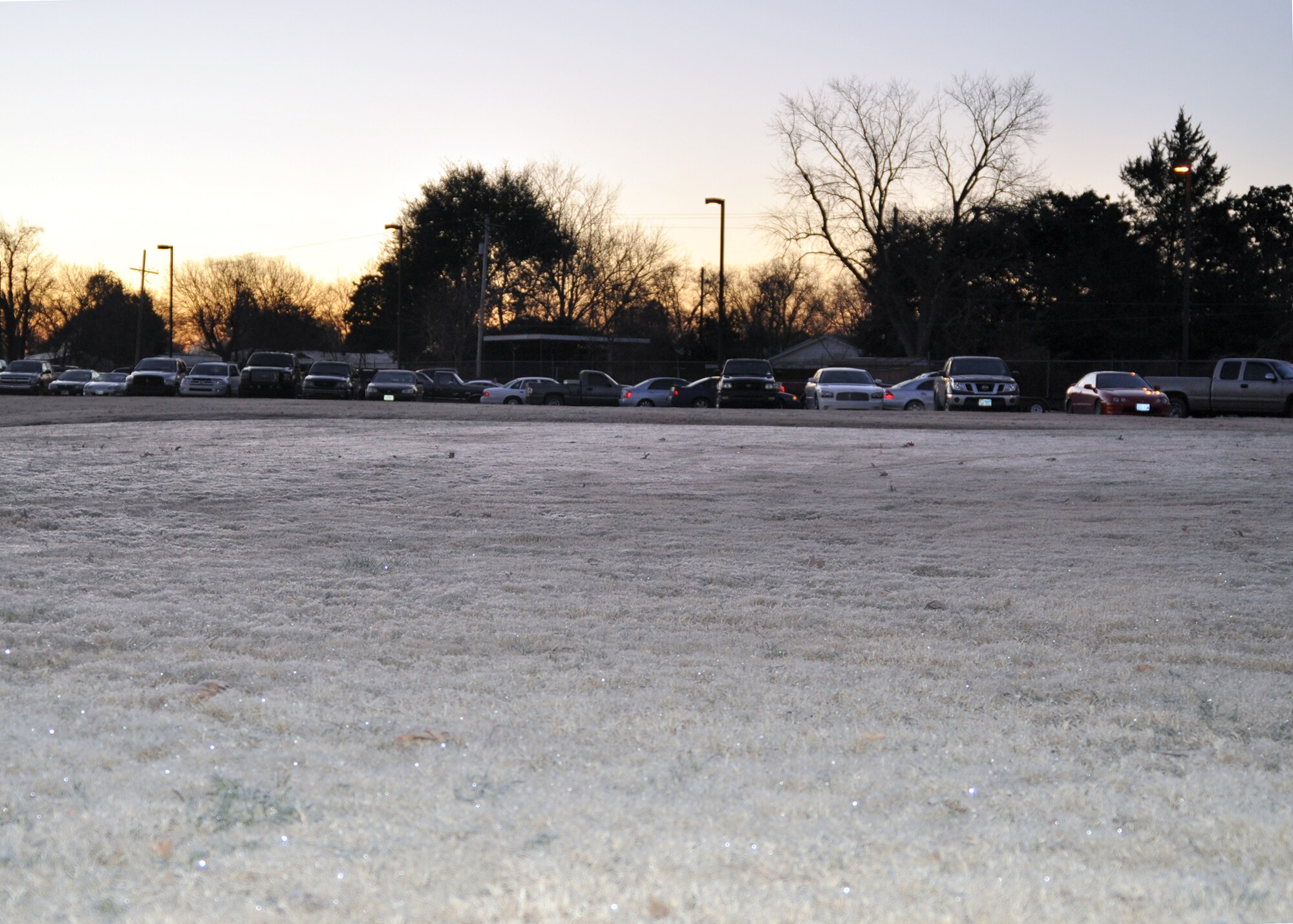 A layer of frost coats the grounds of Barksdale Air Force Base, La., as the 917th Wing begins their Unit Training Assembly (UTA) Weekend Jan. 9, 2010.  The Reservists started their duty day off in 15-degree weather. The weekend was forecasted to include some of the lowest temperatures recorded and up to 13 mph winds due to the unusually cold weather gripping most of the Southern United States. (U.S. Air Force Photo/Senior Airman Crystal Marie Jordan)