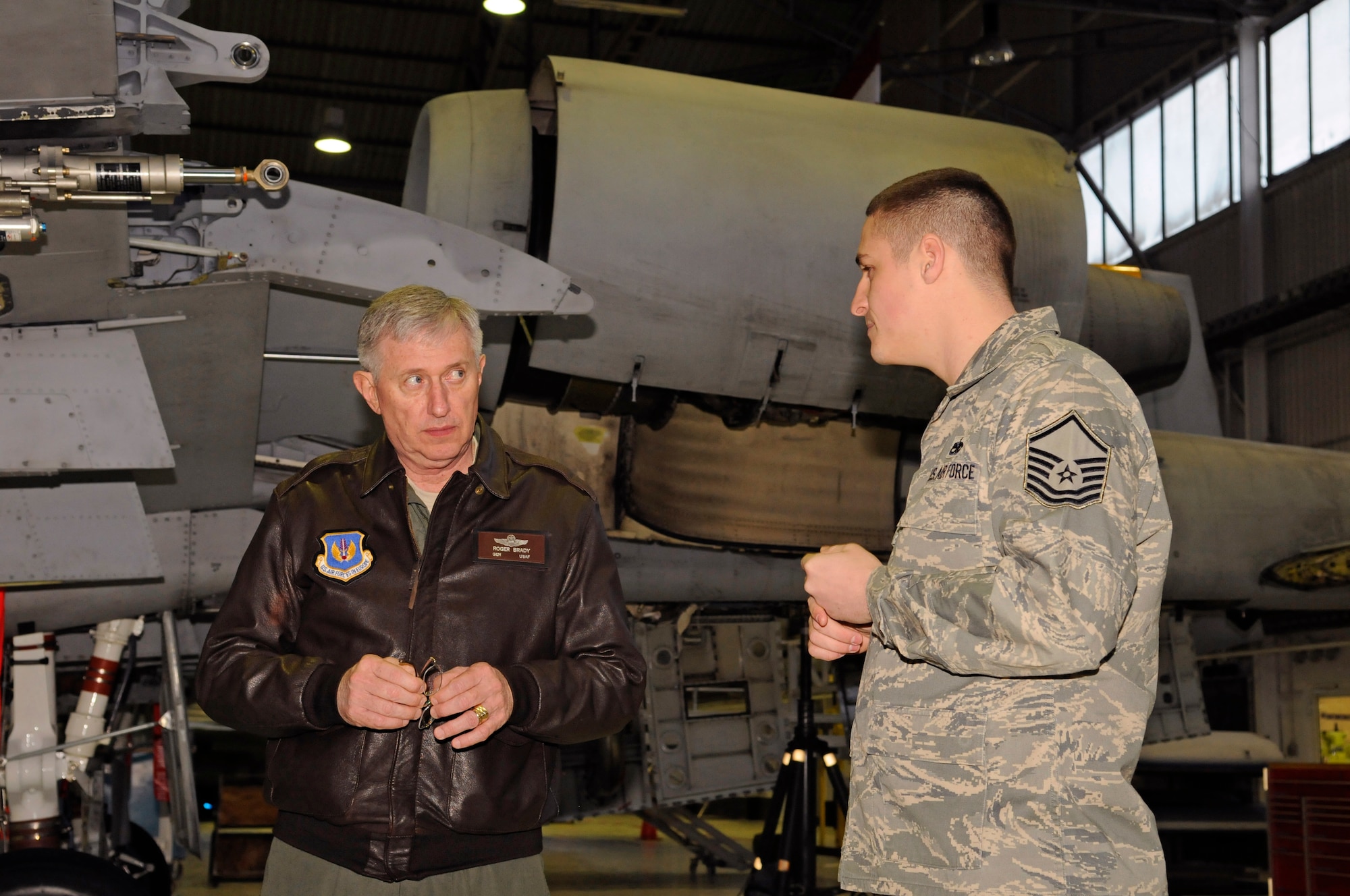 SPANGDAHLEM AIR BASE, Germany – Master Sgt. Jason Hall, 52nd Equipment Maintenance Squadron, explains to General Roger Brady, U.S. Air Forces in Europe, commander, the new processes they are implementing to streamline maintenance on aircraft here Jan. 8. During General Brady’s visit with the 52nd EMS he emphasized the importance of innovating and standardizing procedures throughout the Air Force. (U.S. Air Force photo/Senior Airman Benjamin Wilson)