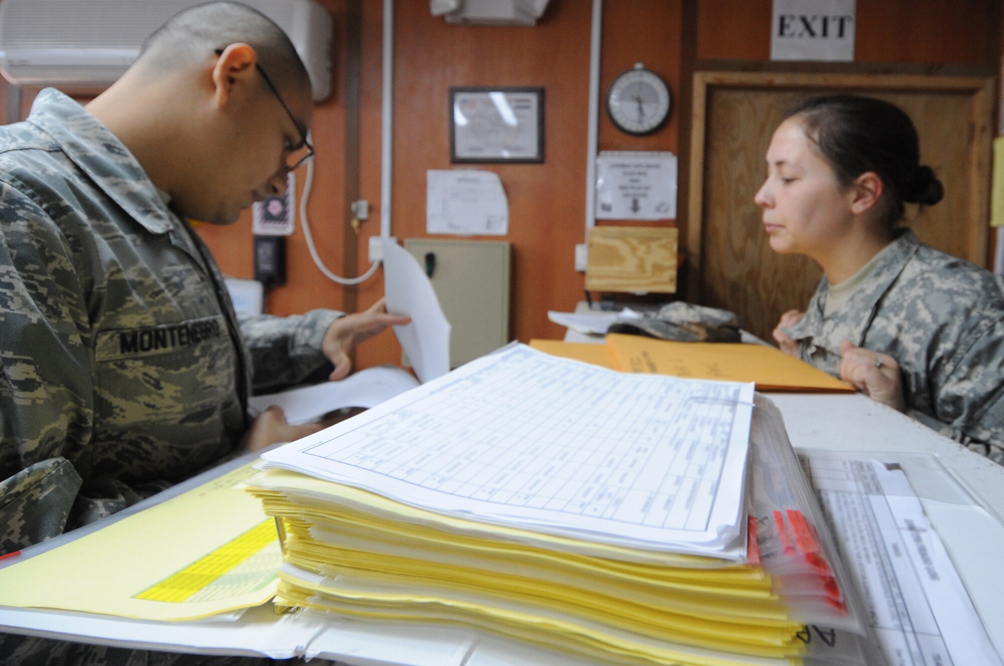 Staff Sgt. Marvin Montenegro, 732nd Expeditionary Logistics Readiness Squadron data entry operator, assists a solider with turning in a vehicle to the Redistribution Property Assistance Team at Joint Base Balad, Iraq, Jan. 6, 2010. RPAT personnel ensure that all Army equipment is turned in properly and either shipped forward to Afghanistan or back to the United States. (U.S. Air Force photo/Senior Airman Brittany Y. Bateman/Released)