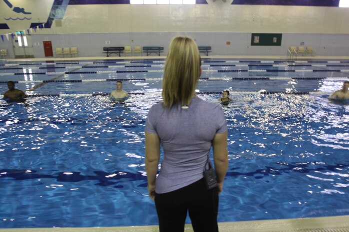 Rebecca Bethard, the course instructor, briefs the swimmers at her Aqua Blast class at the indoor pool in the IronWorks Gym on Jan. 11. The course is available to all ages and skill levels.