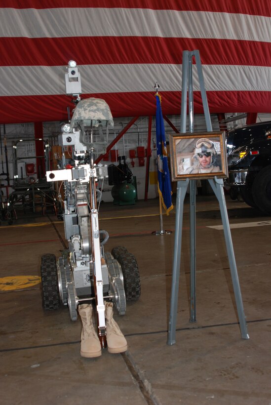 An Explosive Ordnance Disposal memorial tribute is displayed at Scott AFB, Ill. prior to the memorial service Jan. 9 for the 932nd Airlift Wing's Tech. Sgt. Anthony Campbell, Jr. in Hangar 1. Sergeant Campbell was killed in action in Afghanistan Dec. 15. (U.S. Air Force photo/Tech. Sgt. Gerald Sonnenberg)
