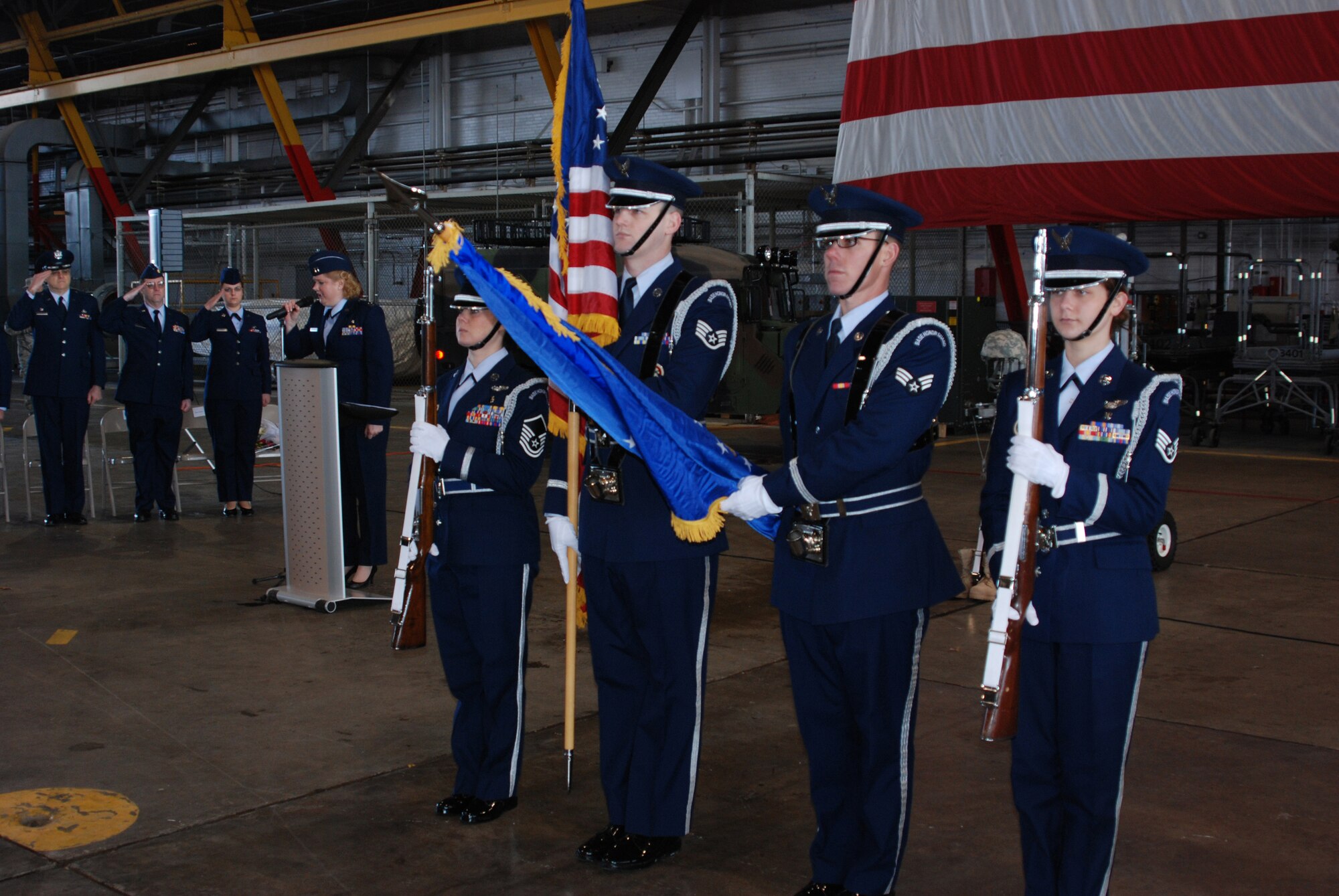 Members of the 932nd Airlift Wing's Honor Guard at Scott AFB, Ill. present the colors during the singing of the National Anthem at the memorial service Jan. 9 for the 932nd Airlift Wing's fallen comrade, Tech. Sgt. Anthony Campbell, Jr. Sergeant Campbell was killed in action Dec. 15 in Afghanistan. (U.S. Air Force photo/Tech. Sgt. Gerald Sonnenberg)