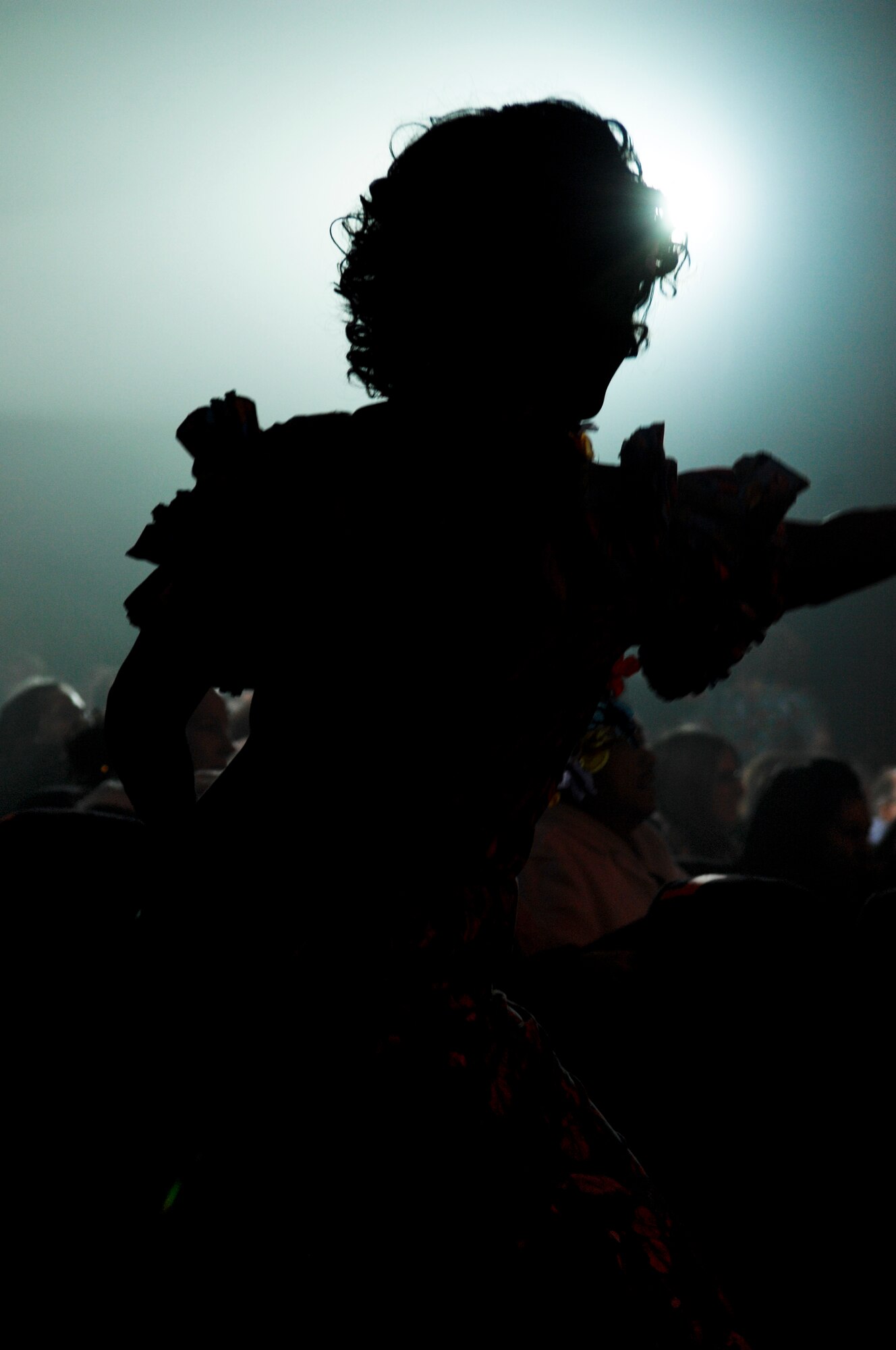 ELMENDORF AIR FORCE BASE, Alaska -- A Tops in Blues performer dances and sings to a Hawaiian style song here Jan. 11. The Tops in Blue are the Air Force's premier entertainment showcase. (U.S. Air Force photo/ Airman 1st Class Jack Sanders)
